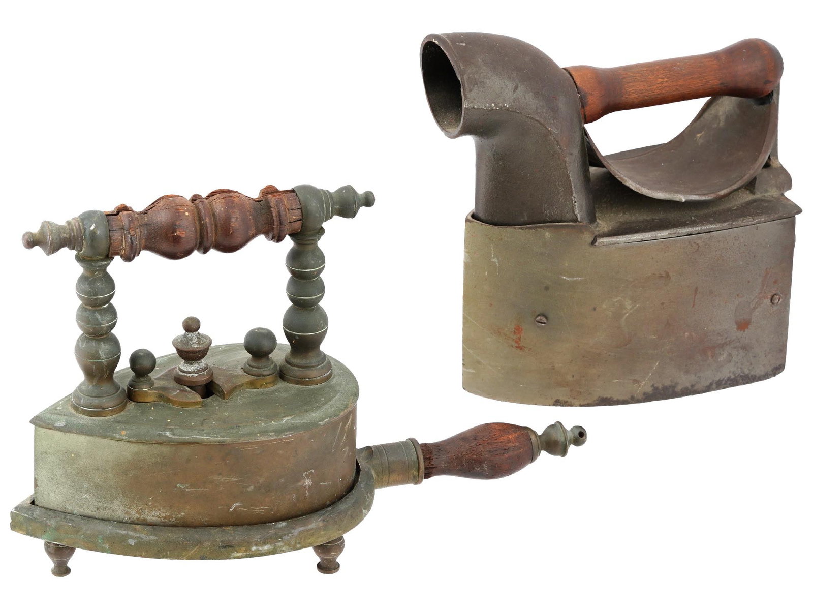 ANTIQUE EUROPEAN AND RUSSIAN ?HARCOAL IRONS: A lot of two antique ?harcoal irons of European and Russian origin. The first iron is most likely of Scottish origin from the early 20th century. The iron has a complex upper handle with relief rounde
