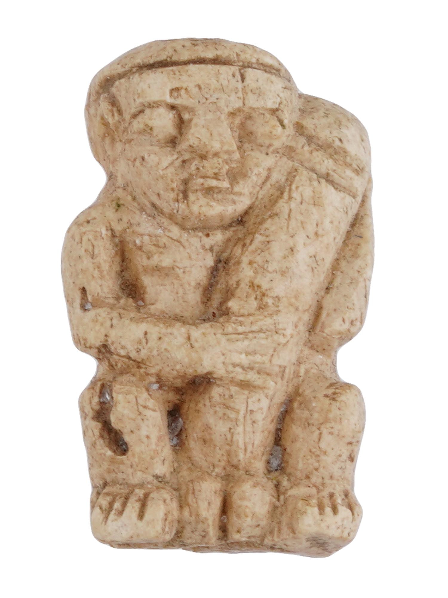 ANCIENT EGYPTIAN LATE PERIOD CARVED EROTIC PENDANT: An ancient Egyptian Late Period, ca. 700 to 200 BC, hand carved from natural material figural pendant made in the ancient manner. The pendant represents an erotic figure, carved with detailed patterns