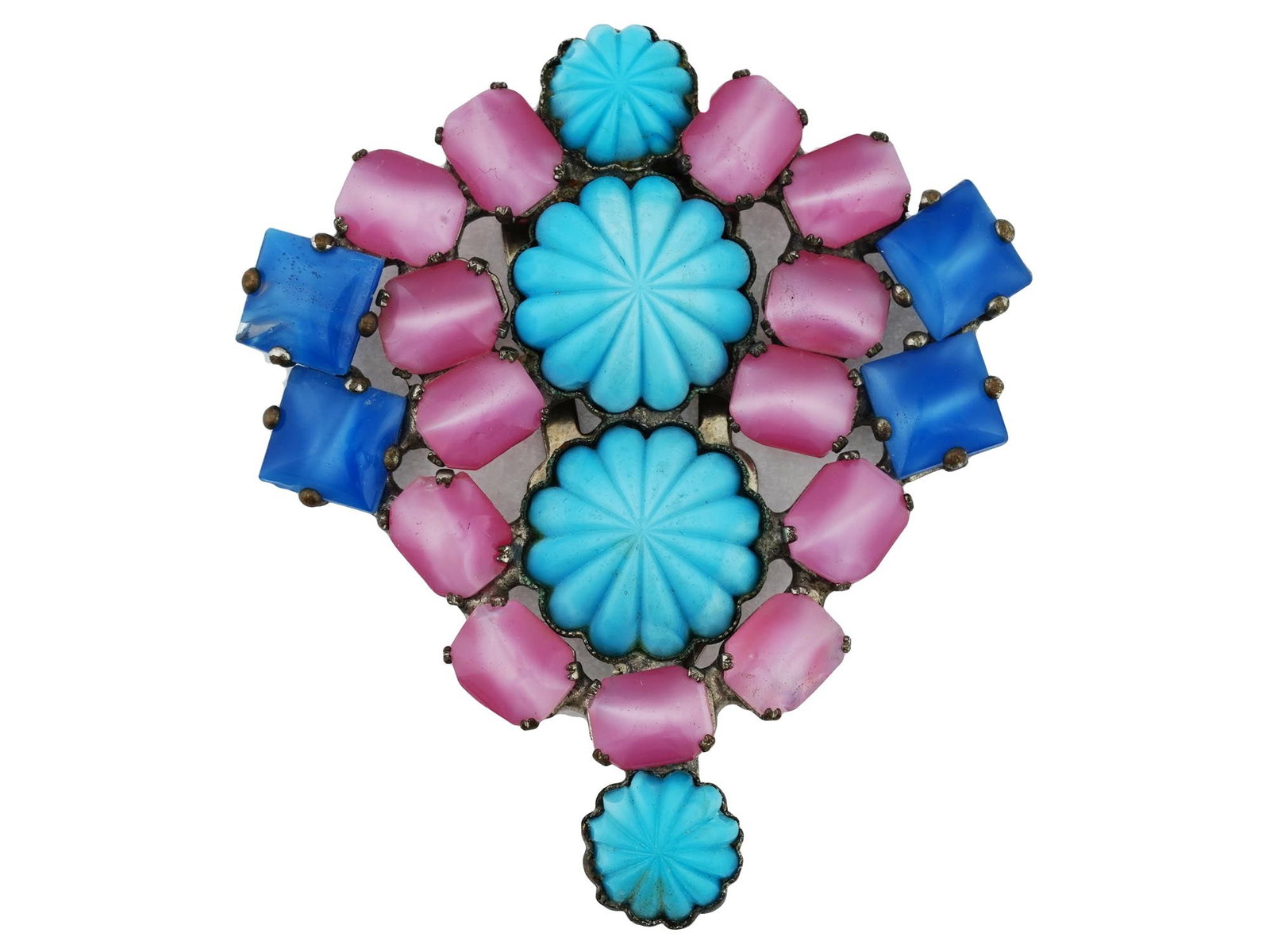 LARGE ISSER SINGER AND SON COSTUME JEWELRY BROOCH CLIP: A large antique Czechoslovakian Isser Singer and Son costume jewelry brooch clip. The clip is made in a floral design, decorated with various stones including glass stones in blue, pink and turquoise 