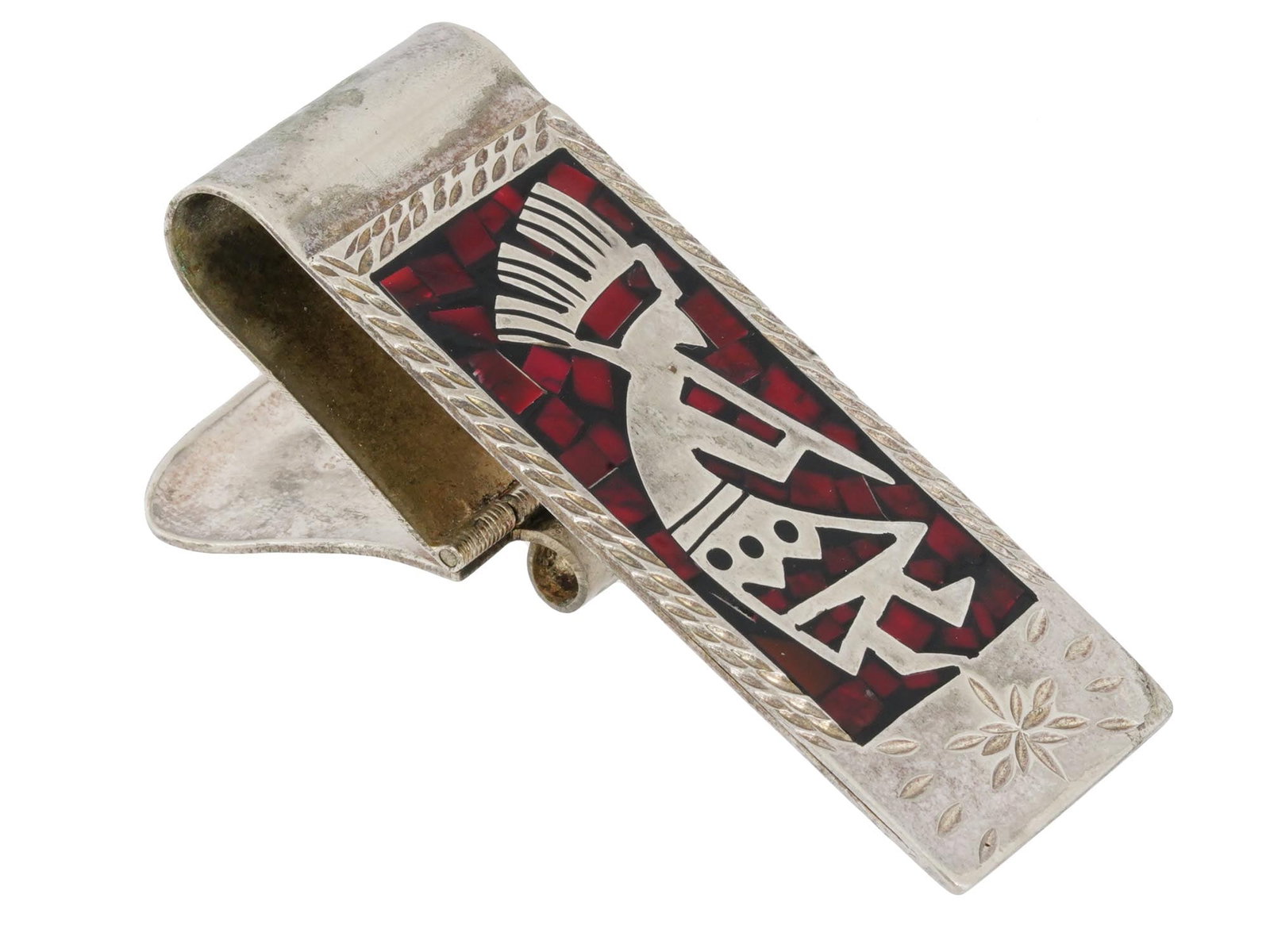 MEXICAN ENGRAVED MOSAIC DESIGN SILVER MONEY CLIP: A vintage Mexican Silver money clip. The money clip is made in a mosaic design and decorated with an engraved image of an Ethnical human figure. The piece is adorned with engraved floral and foliage m