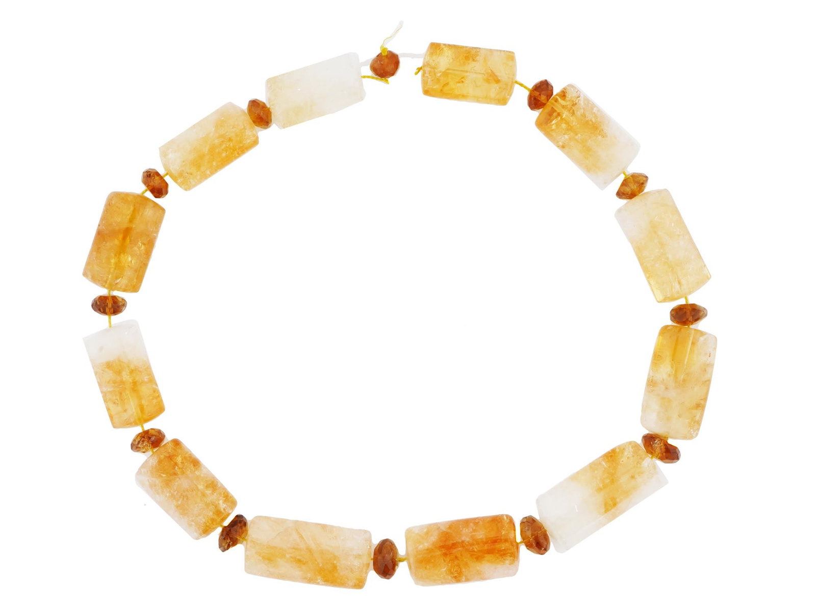 CITRINE STONE BEADS OF ELONGATED SHAPE FOR NECKLACE: A set of citrine stone beads in an elongated faceted shape, strung on a cord with smaller faceted beads interspersed throughout, perfect for crafting into a necklace. The warm, golden hues of the citr