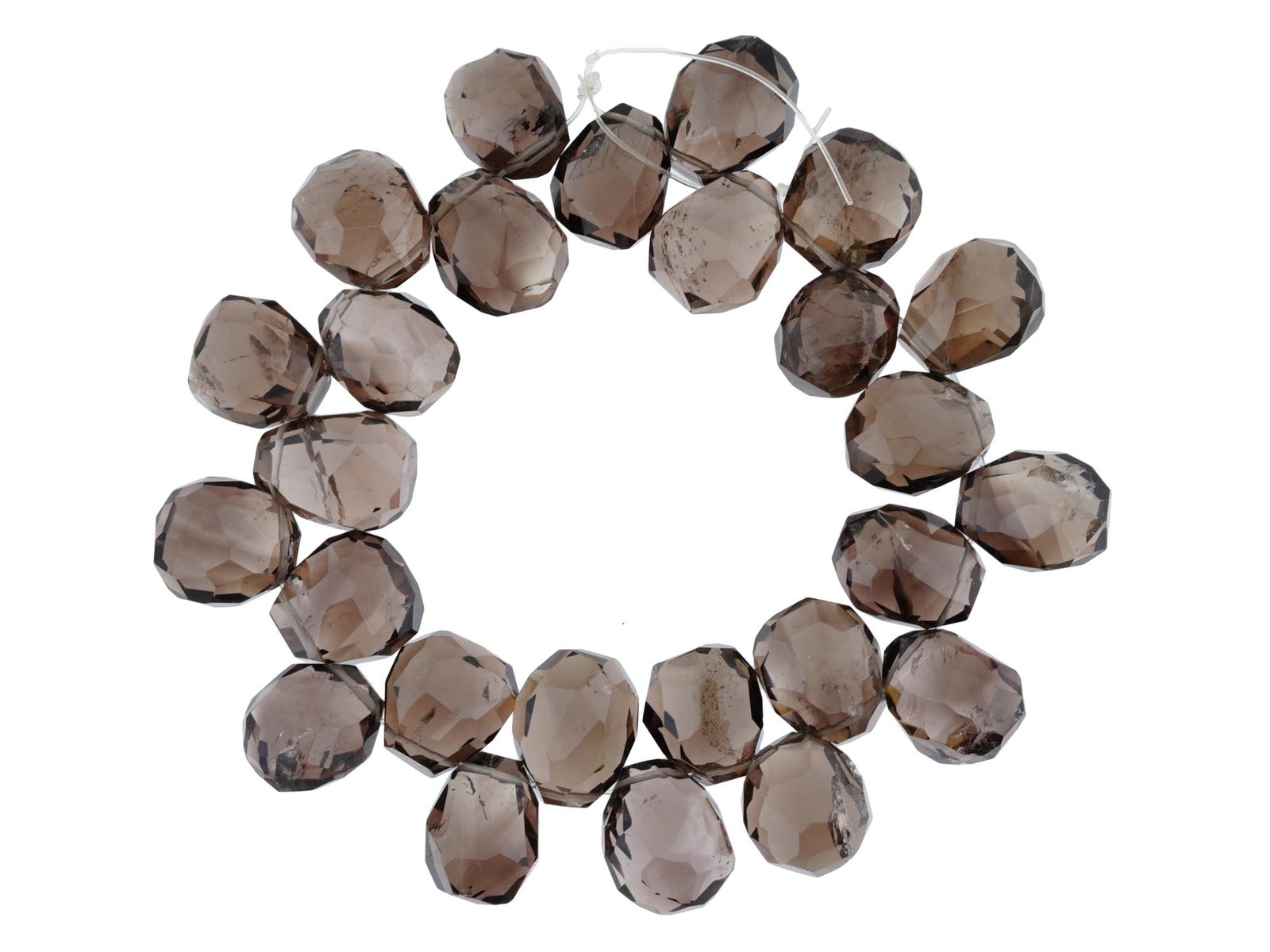 SET OF CUT TOPAZ STONE BEADS FOR NECKLACE: A set of cut topaz stone beads, strung on a cord and ready for crafting into a necklace. The beads exhibit the radiant clarity and brilliance typical of topaz, with their light-reflecting cuts enhanci