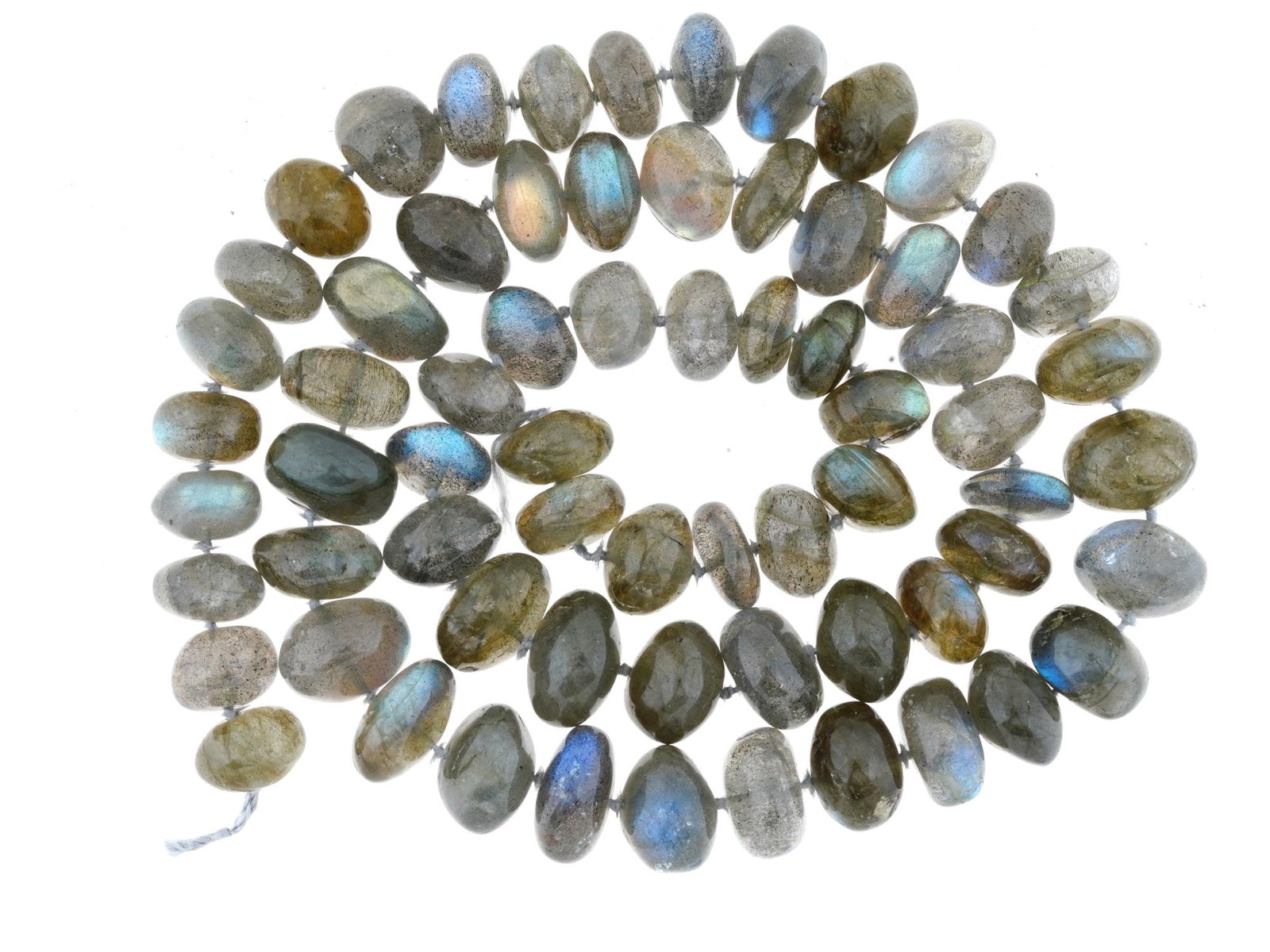 COLLECTION OF ROUND DRILLED LABRADORITE BEADS ON ROPE: A collection of round drilled labradorite beads on a rope. The beads are of different shapes and sizes and adorned with different irrigation: blue, green, purple, pink. Antique and Vintage Gem Stones,