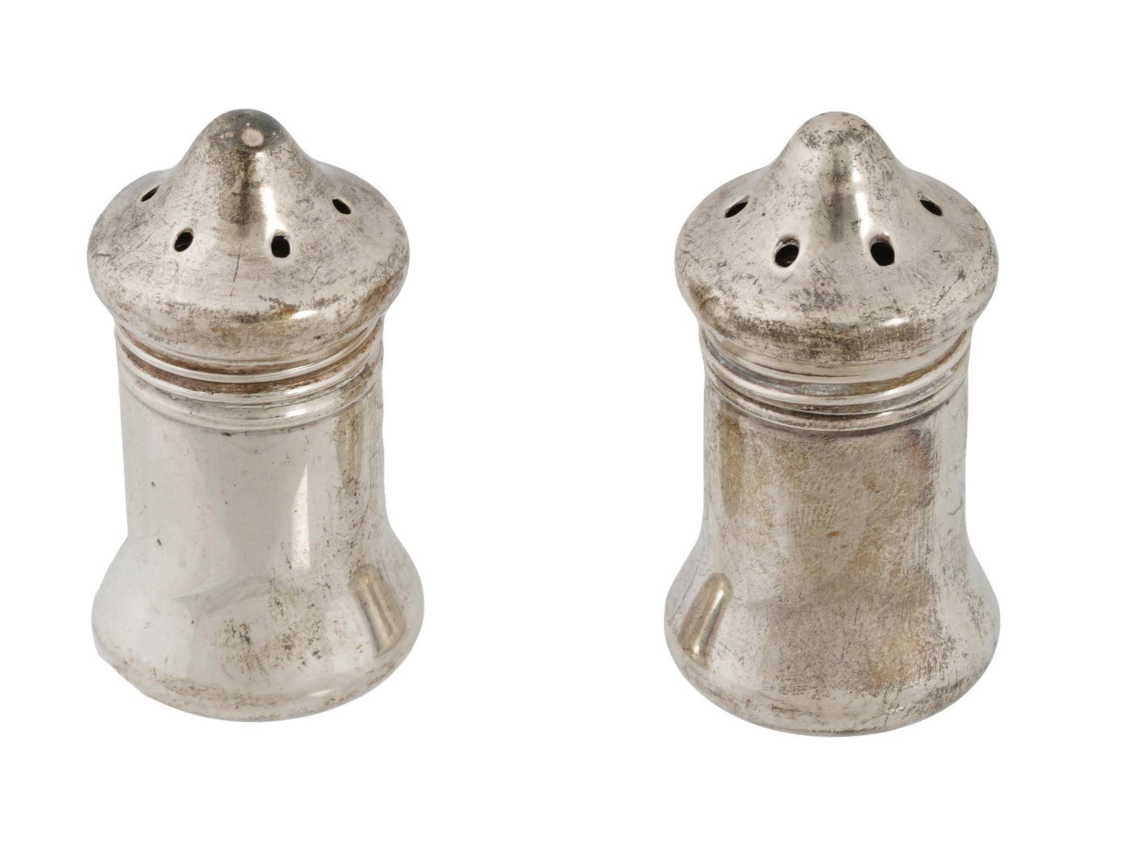 ANTIQUE AMERICAN SILVER SALT AND PEPPER SHAKERS: A pair of antique American Sterling Silver Salt and Pepper Shakers by V. Lollo. The salt and pepper shakers are slightly wider at the top and bottom. The tip of both items is pointed and has holes for