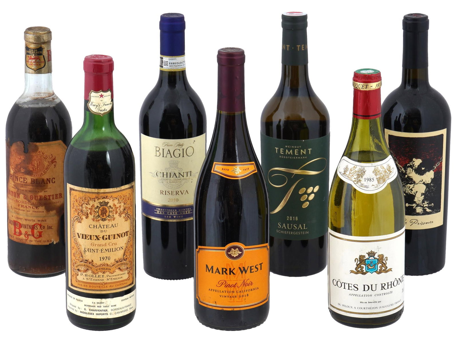 MARK WEST PRINCE BLANC COTES DU RHONE WINE BOTTLES: A lot of vintage sealed wine bottles. A total of 7 items. Prince Blanc, Barton et Guestier, Bordeaux, France. Chateau du Vieux-Guinot, Grand Cru, Saint Emilion, 1970. Biagio, Chianti, Riserva 2010. Ma