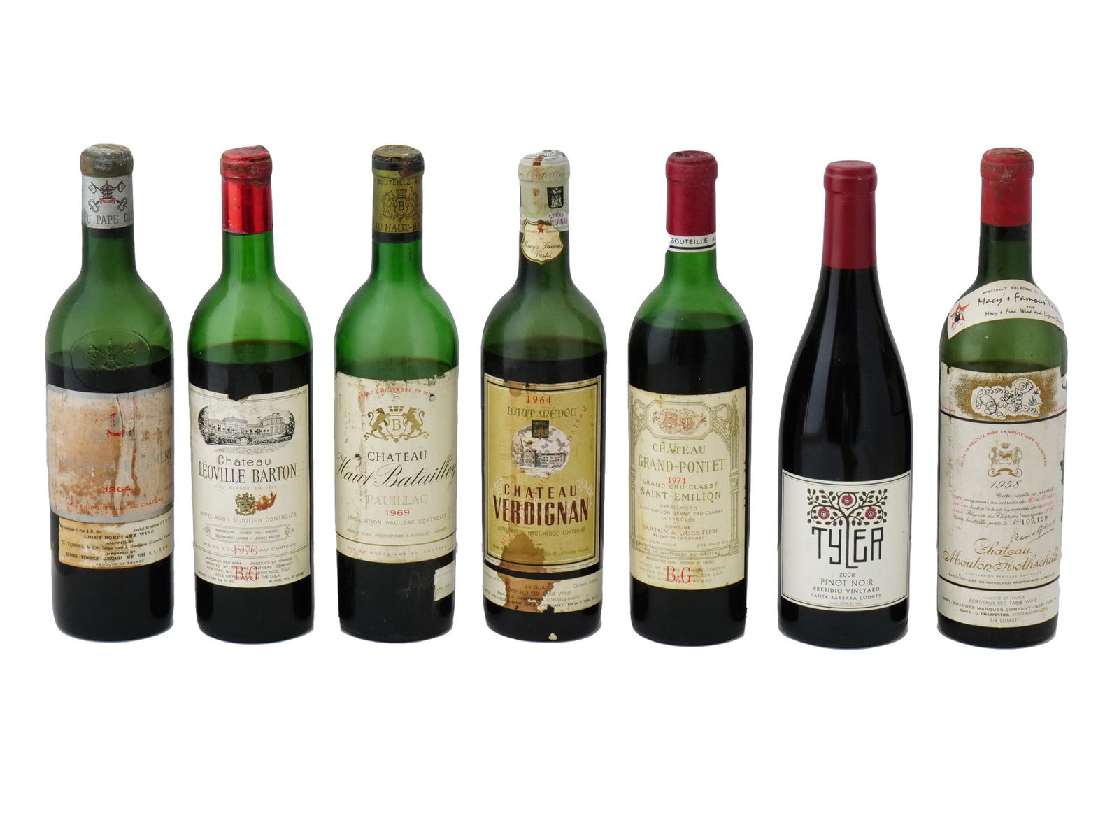 CHATEAU MOUTON ROTHSCHILD VERDIGNAN WINE BOTTLES: A lot of vintage sealed wine bottles. A total of 7 items. Chateau Pape Clement, Bordeaux, 1964. Chateau Leoville Barton, Cru Classe, 1970. Chateau Haut Batailley, Pauillac, 1969. Chateau Verdignan, Ha