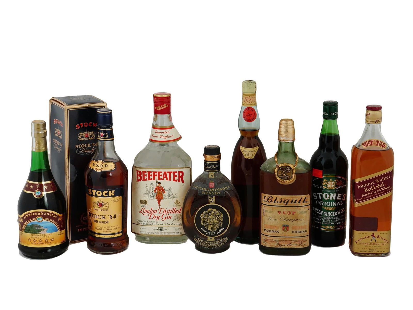 VTG BOTTLES OF ALCOHOLIC DRINKS FROM RENOWNED BRANDS: A collection of eight bottles of alcoholic beverages from renowned brands, featuring Armenian Five Star Brandy, Johnnie Walker Red Label Whisky, Stones Green Ginger Wine, Barone Ricasoli Wine, Etichet