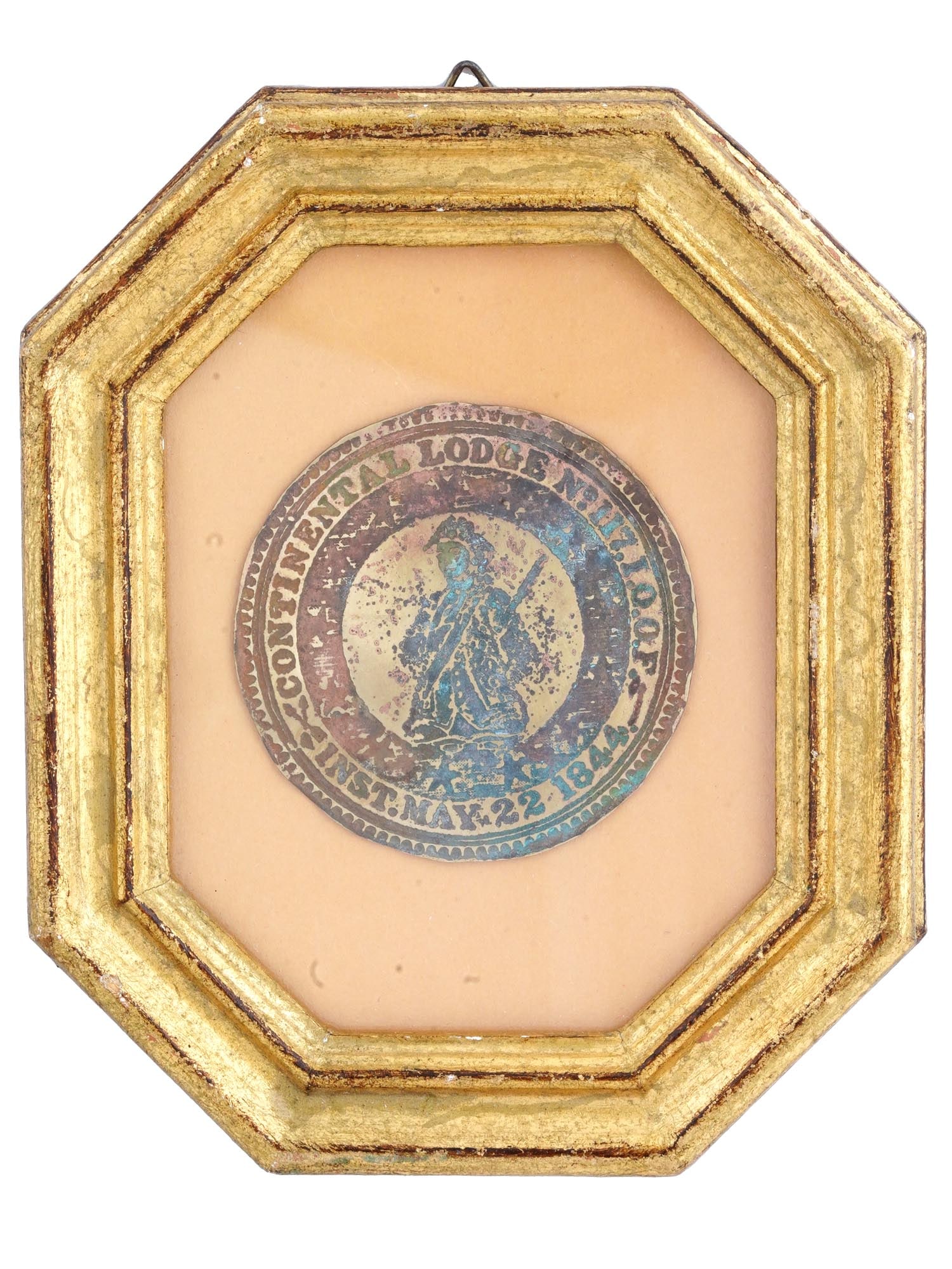 ANTIQUE AMERICAN IOOF MASONIC LODGE MEDALLION: An antique mid-19th century American copper medallion. Round piece representing a male figure with a gun in the center, encompassed with inscription Continental Lodge no. 117, IOOF, Inst. May 22, 1844