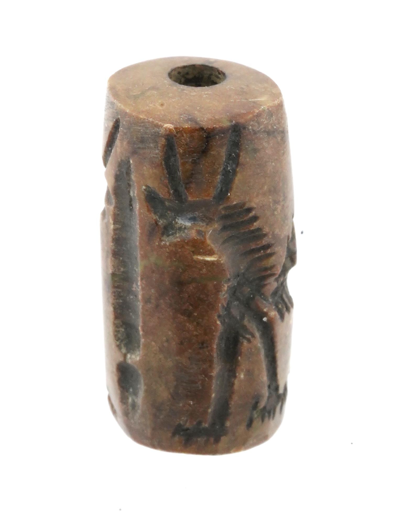 ANCIENT CYLINDER SEAL CARVED FROM BROWN STONE (1 of 5)