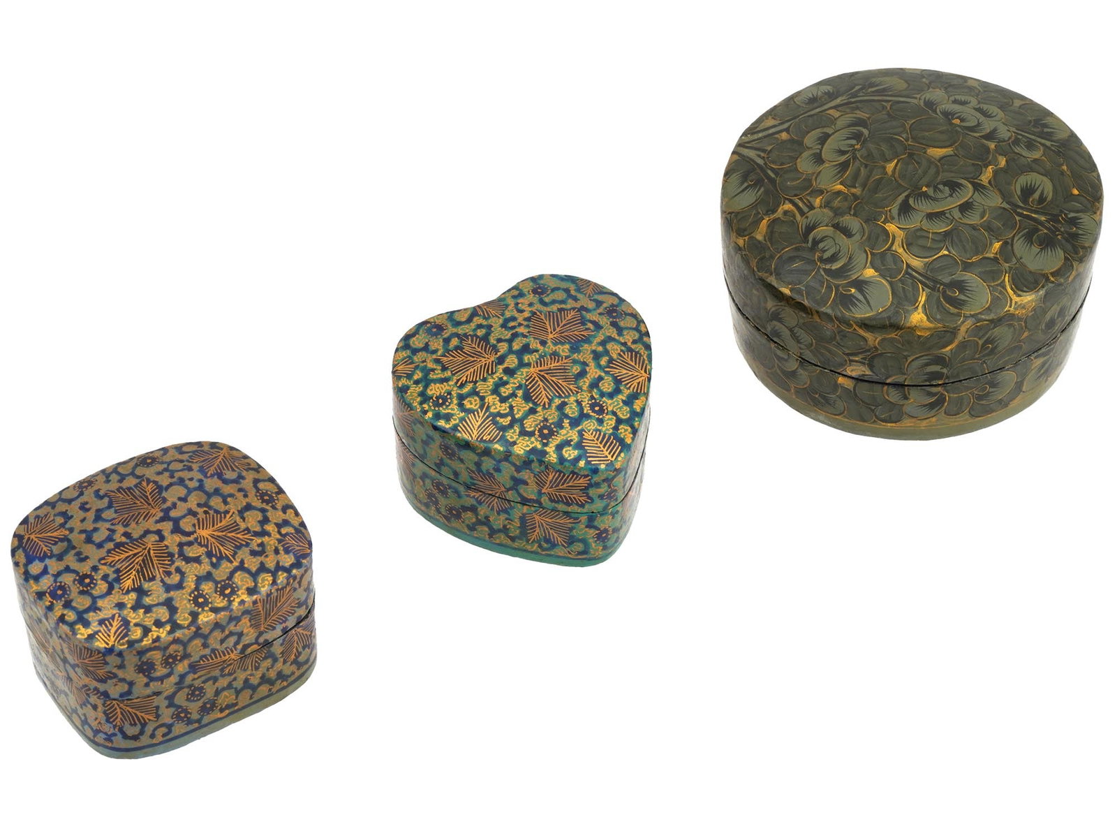 VINTAGE INDIAN HAND PAINTED WOODEN TRINKET BOXES: A group of three vintage Indian hand painted wooden boxes, each featuring intricate floral motifs. One box in the round shape is adorned with painted flowers with gold accents, the second in rectangul