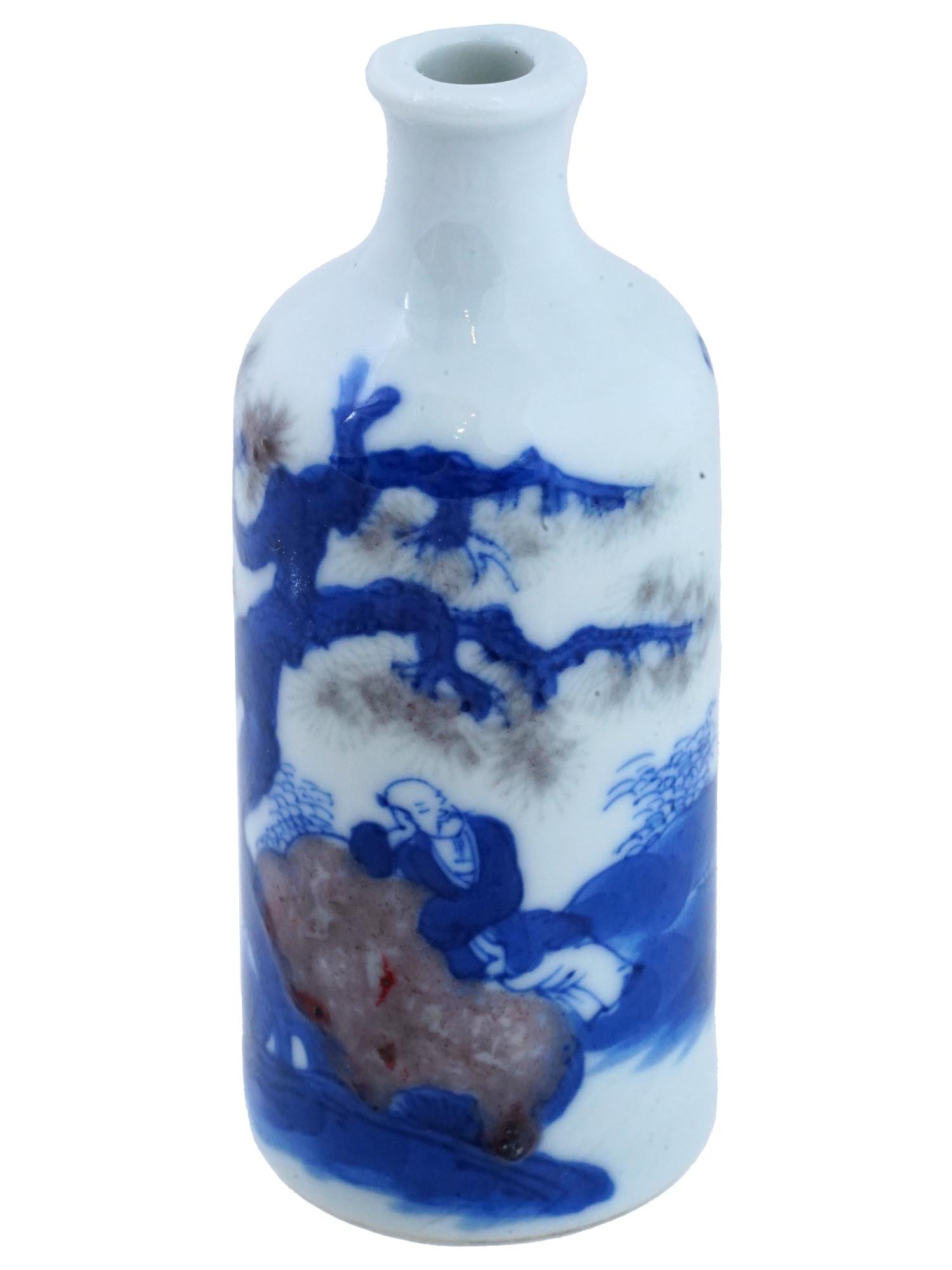 ANTIQUE CHINESE BLUE AND WHITE PORCELAIN SNUFF BOTTLE: An antique Chinese blue and white porcelain snuff bottle, adorned with a scene with a figure in the natural landscape. The classic blue and white color palette exemplifies the finesse of traditional C