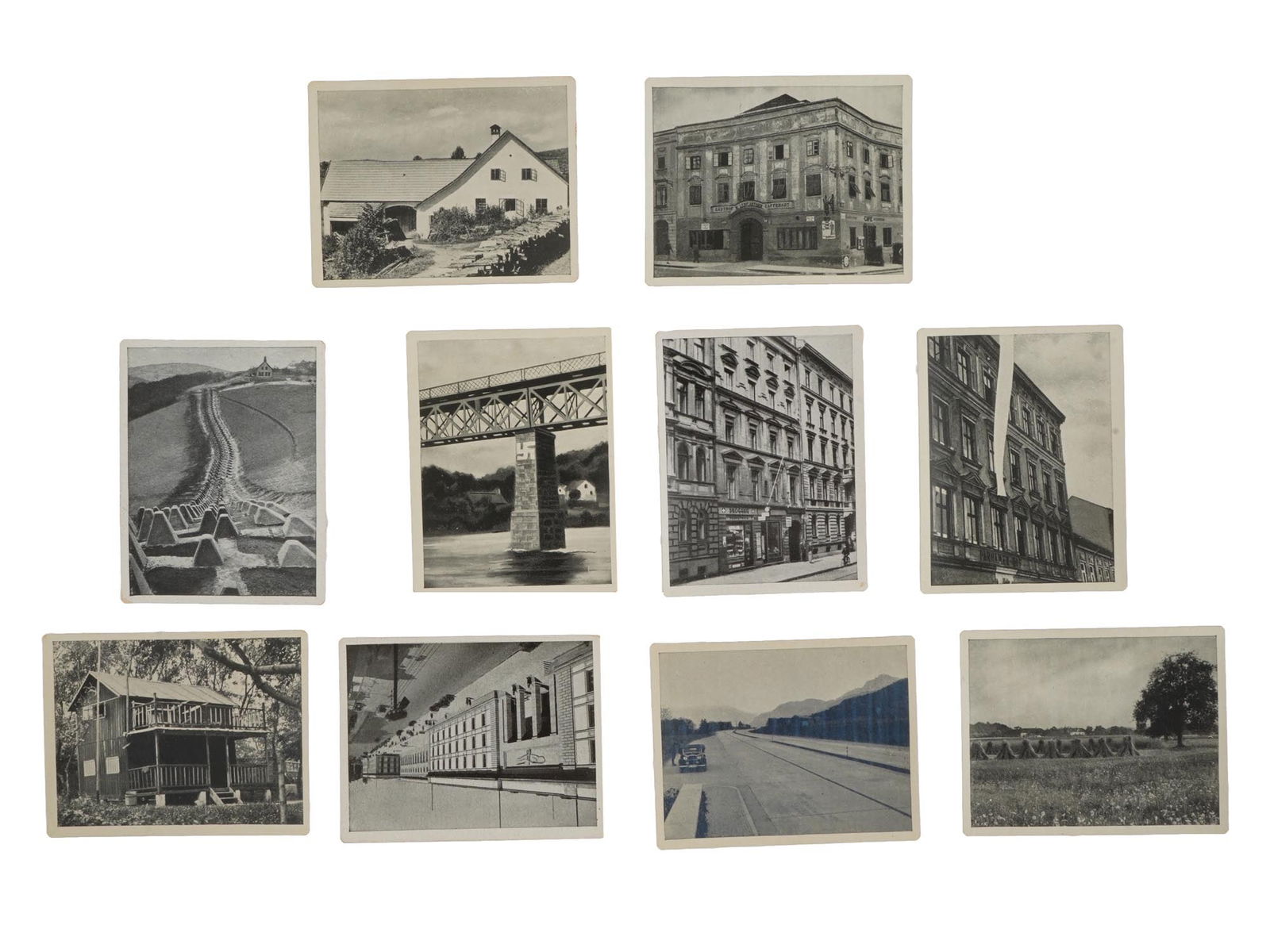 WWII ERA AUSTRIAN ADOLF HITLER CIGARETTE CARDS: A lot of World War II era cigarette cards issued by Austria Tabakwerke. From the series titled Adolf Hitler und sein Weg zu Grossdeutschland, Adolf Hitler and His Path to Greater Germany, after 1939.