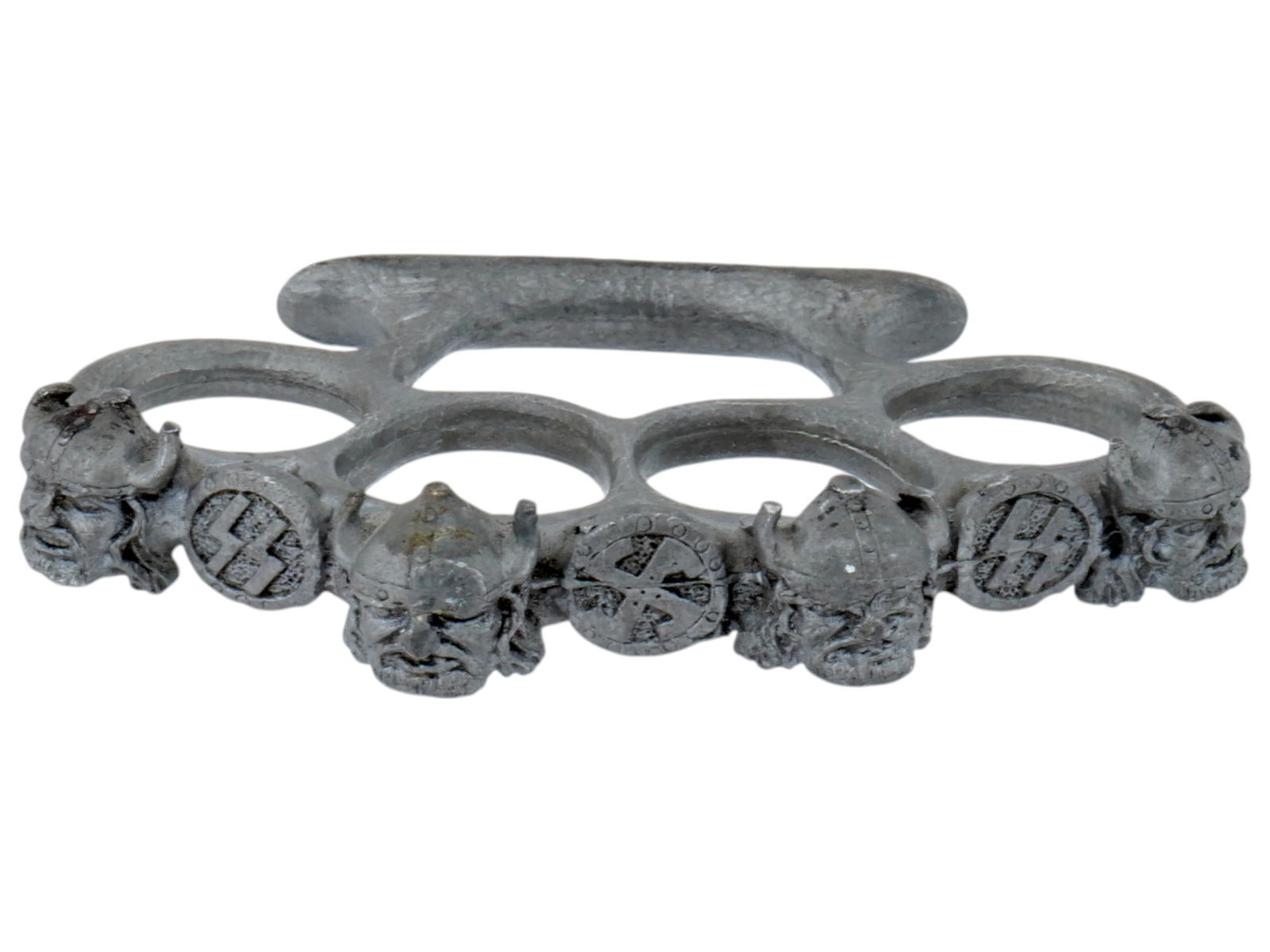 WWII NAZI GERMAN VIKING TRENCH ART HAND KNUCKLE: A WWII type Nazi German Viking trench art hand knuckle. The knuckle is a heavy metal object with holes for four fingers. It is decorated with figurative Viking heads in helmets, as well as images of S
