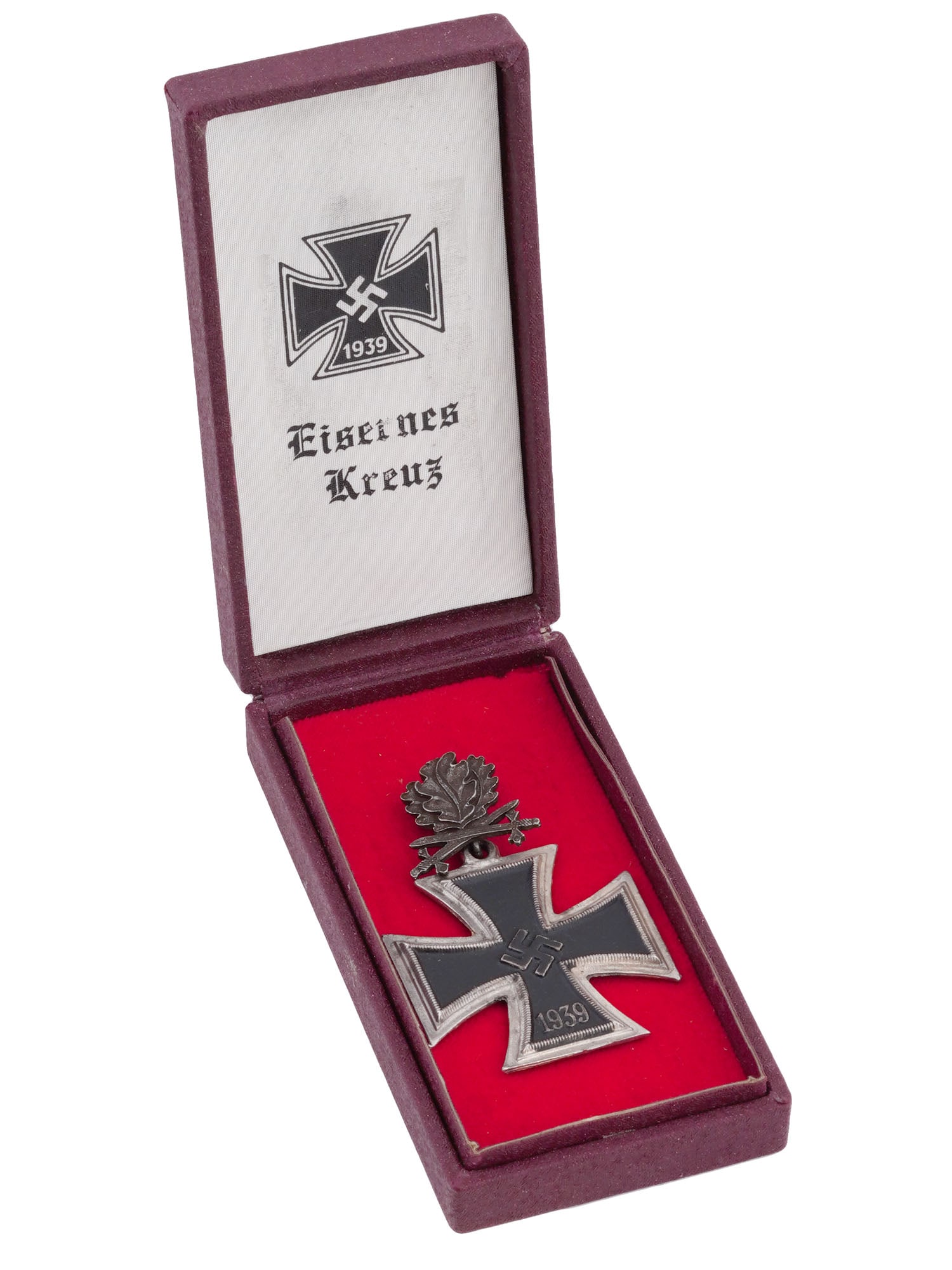 WWII GERMAN KNIGHTS CROSS WITH OAK LEAVES AND SWORDS: A WWII Nazi German Knights Cross of the Iron Cross with Oak Leaves and Swords, a prestigious military decoration awarded for extraordinary valor and significant contributions to the German war effort.