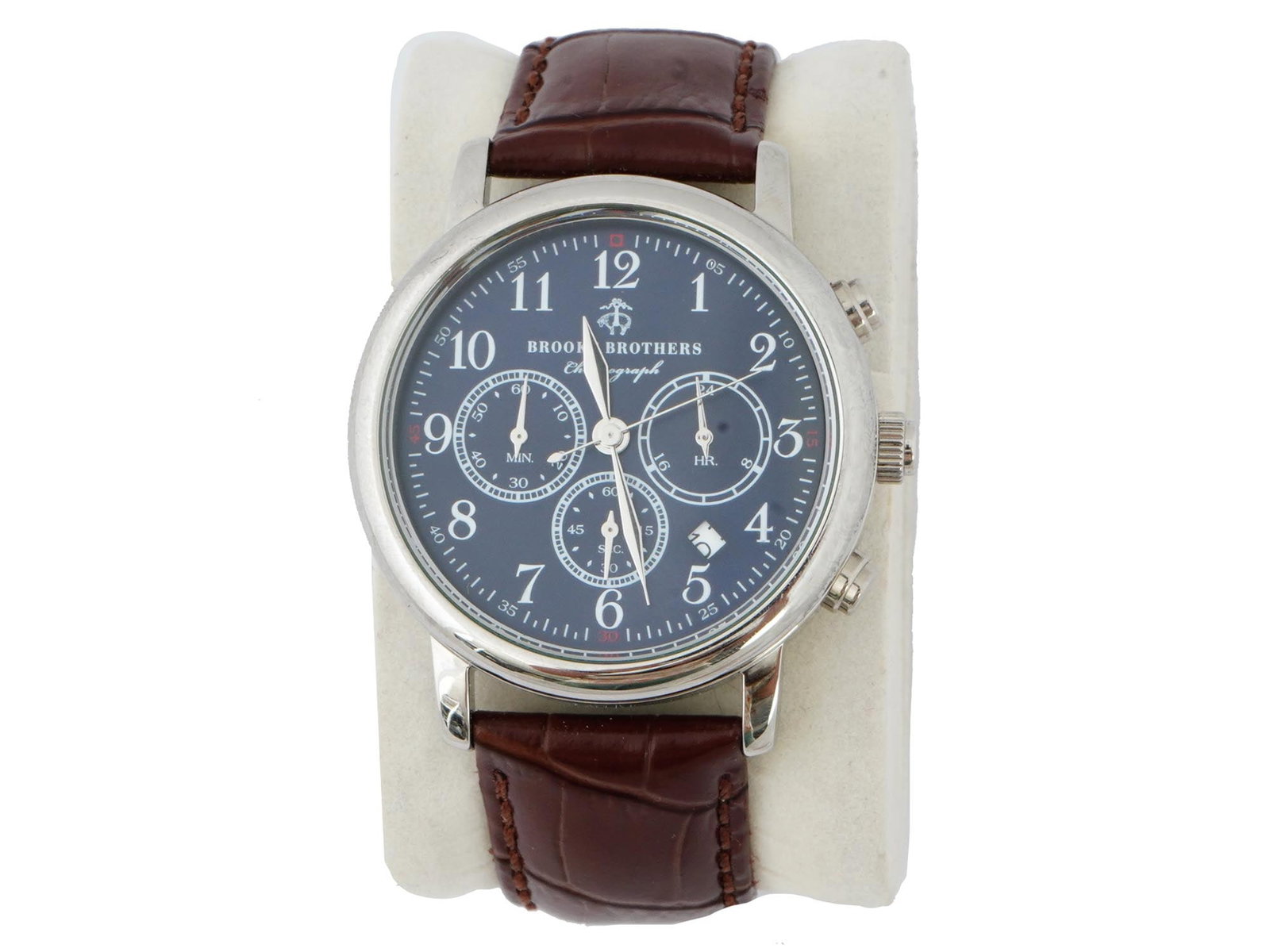 VINTAGE BROOKS BROTHERS MENS WATCH CHRONOGRAPH: A vintage Brooks Brothers mens watch. Features a polished silver stainless steel case that showcases a navy dial adorned with Arabic numeral indices. The 12-hour dial style watch is powered by quartz 