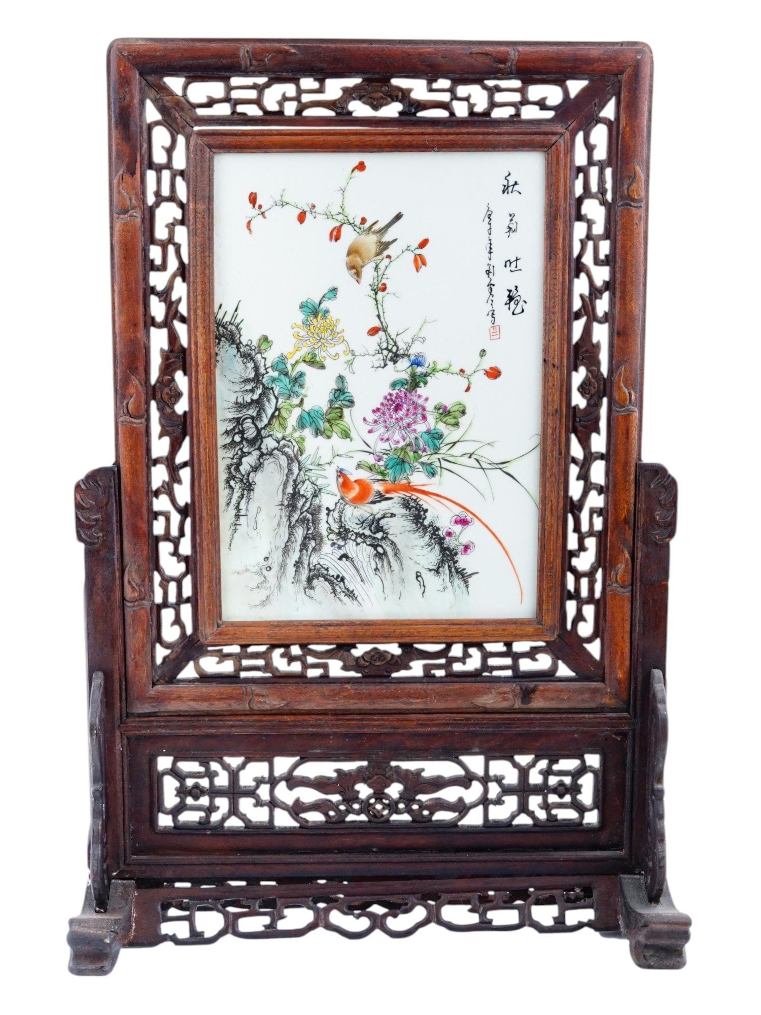 CHINESE HAND PAINTED PORCELAIN TABLE SCREEN IN FRAME: An antique Chinese hand carved and hand painted porcelain table screen panel. The screen panel is adorned with a hand painted design representing branches with blossoming flowers and birds. Inscribed