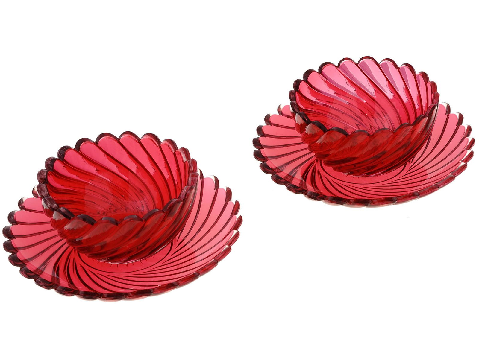 VINTAGE RUBY RED CRYSTAL GLASS BOWLS AND PLATES: A lot of vintage ruby red crystal tableware. A total of two bowls and two plates. The pieces have a swirl design with figurative rims. Collectible Glassware, Tableware And Serveware. Dimensions: Plate
