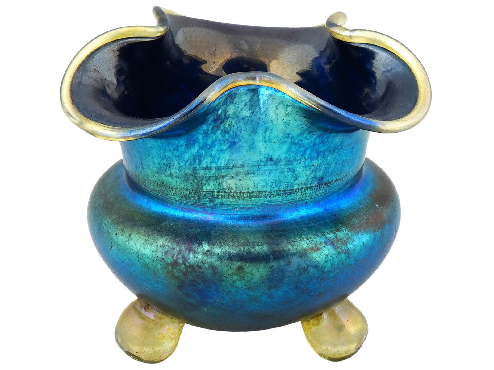 ANTIQUE BOHEMIAN LOETZ WITWE IRIDESCENT GLASS VASE: An antique Johann Loetz Witwe glass vase, crafted from colored glass and adorned with an iridized finish. The vase is predominantly blue, with hints of green, giving it a shimmering effect. It has a b