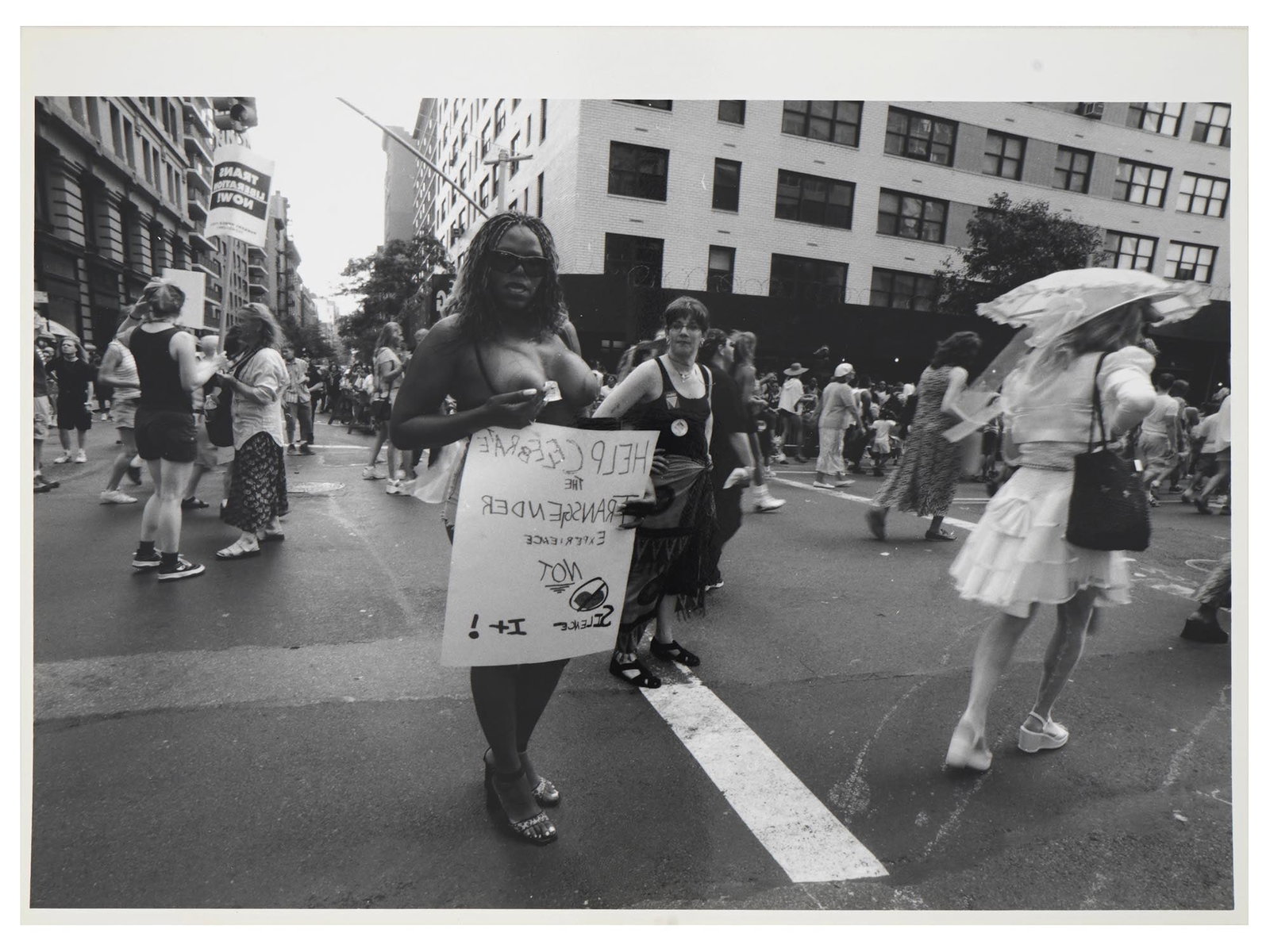 VINTAGE AMERICAN PHOTO GAY PRIDE PARADE NEW YORK 2000: A vintage American photograph from the Gay Pride Parade in New York City in 2000, taken by Francesco Corenzetti. Includes credits and additional information to the back. Vintage American Photographs A