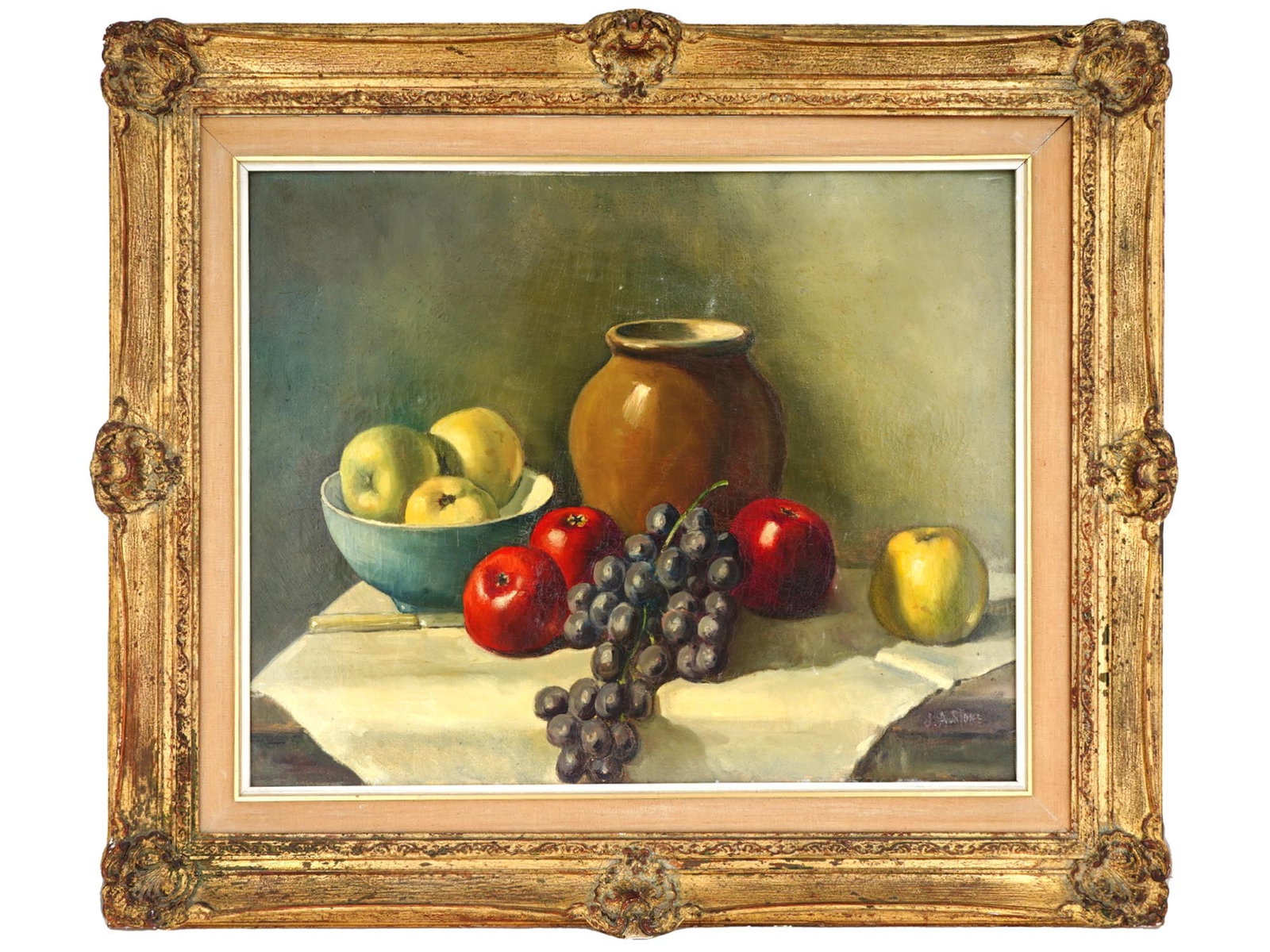 AMERICAN FRUIT STILL LIFE OIL PAINTING SIGNED: Oil on canvas painting. American, mid-20th century. The artwork represents a still life with apples, grapes, and ceramic jug. Signed by the artist in the lower right, J.A. Stone. Golden frame. Collect