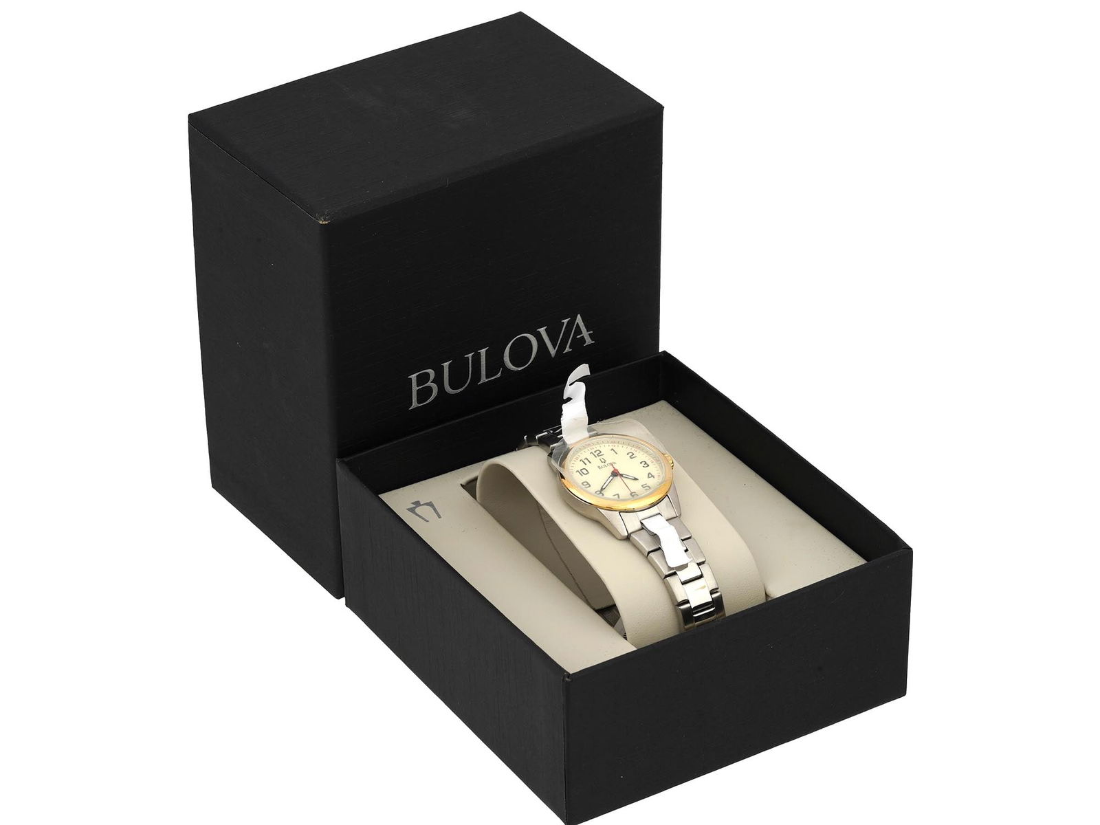 BULOVA WOMENS STAINLESS STEEL WRISTWATCH IOB: A vintage ladies stainless steel automatic wristwatch by Bulova. Water resistant. Round case, gilt polished bezel, single crown. White dial with Arabic numerlas, marked Bulova. Link bracelet. Hallmark