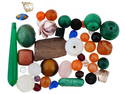 COLLECTION OF ASSORTED CARVED GLASS STONES BEADS