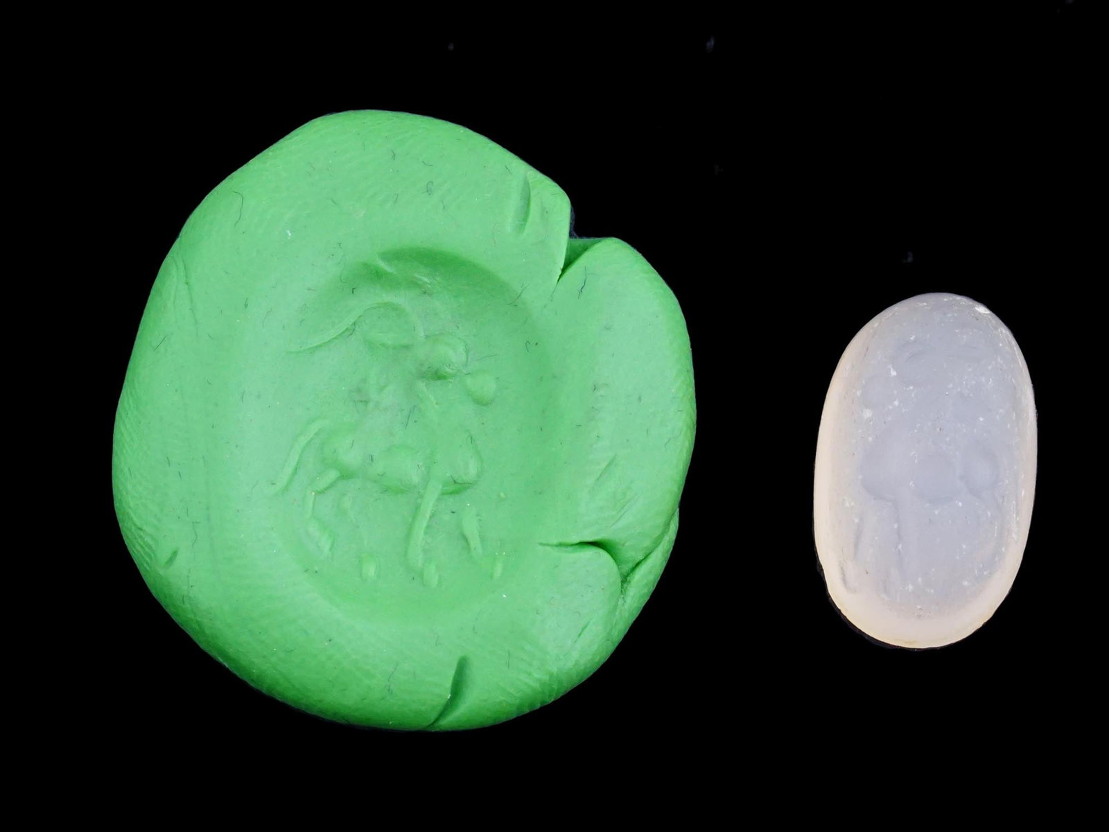 CARVED AGATE INTAGLIO WITH ANCIENT ROMAN PEGASUS IMAGE: A carved agate intaglio featuring a detailed ancient Roman depiction of Pegasus, the legendary winged horse associated with divine inspiration and heroism in classical mythology. Such pieces were ofte