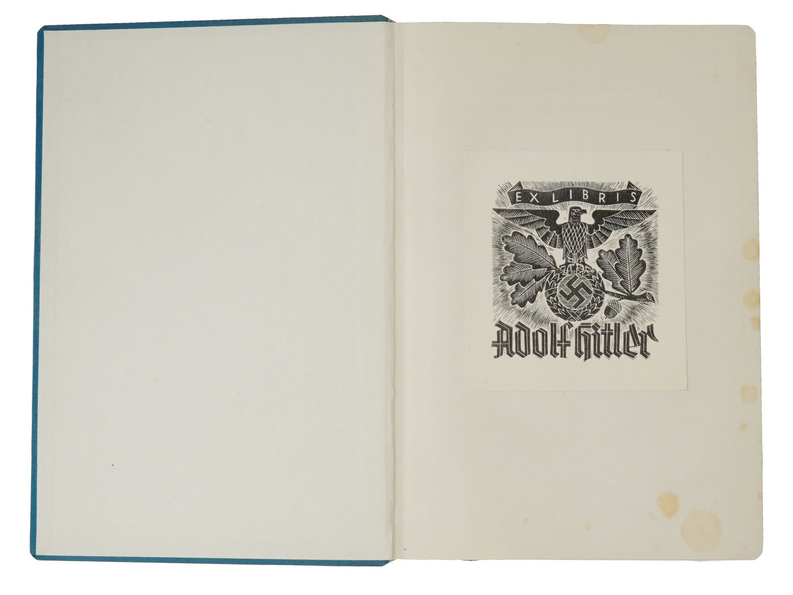 RACIAL HYGIENE BOOK FROM ADOLF HITLERS LIBRARY: A German book titled Rasse, Geist und Seele by Lothar Gottlieb Tirala. Published by Lehmanns Verlag, Munich, 1935. Hardcover, with illustrations. Handwriting dated 1938 on the title page. Woodcut book