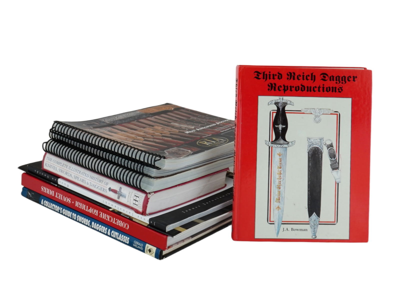VINTAGE BOOKS ABOUT SWORDS AND AUCTION CATALOGS: A lot of 8 vintage books dedicated to cold weapons, swords, and daggers. Encyclopedia and albums on Soviet and German weapons, Rock Island Auction catalogs. Antiquarian Librarian Books Publications Fo