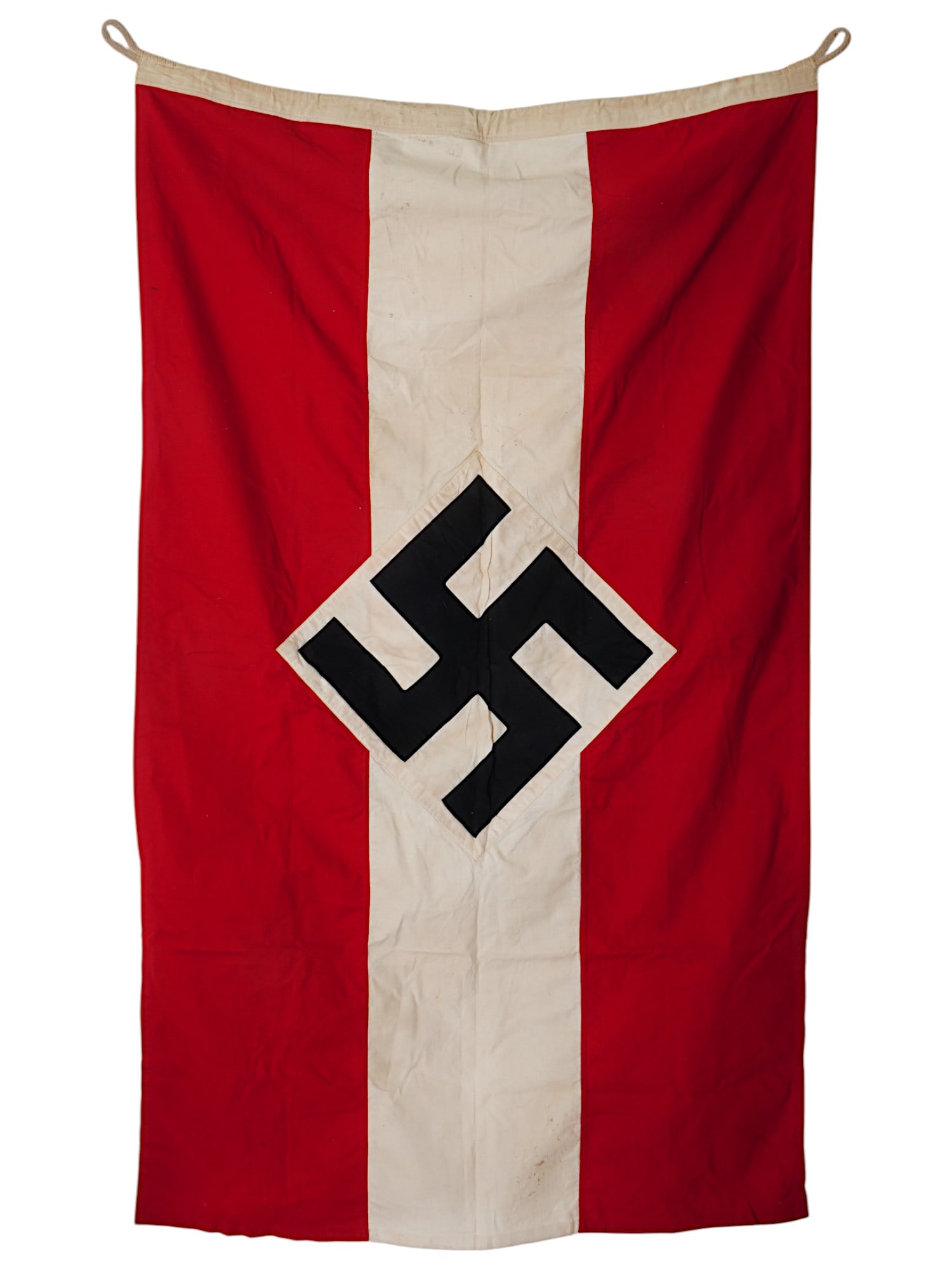 WWII NAZI GERMAN THIRD REICH HITLER YOUTH FLAG: A WWII Nazi German Third Reich Hitler Youth flag. Made of red, white, and black cotton. Double sided, multi pieces construction. The front shows a swastika insignia in a horizontal diamond. Includes m