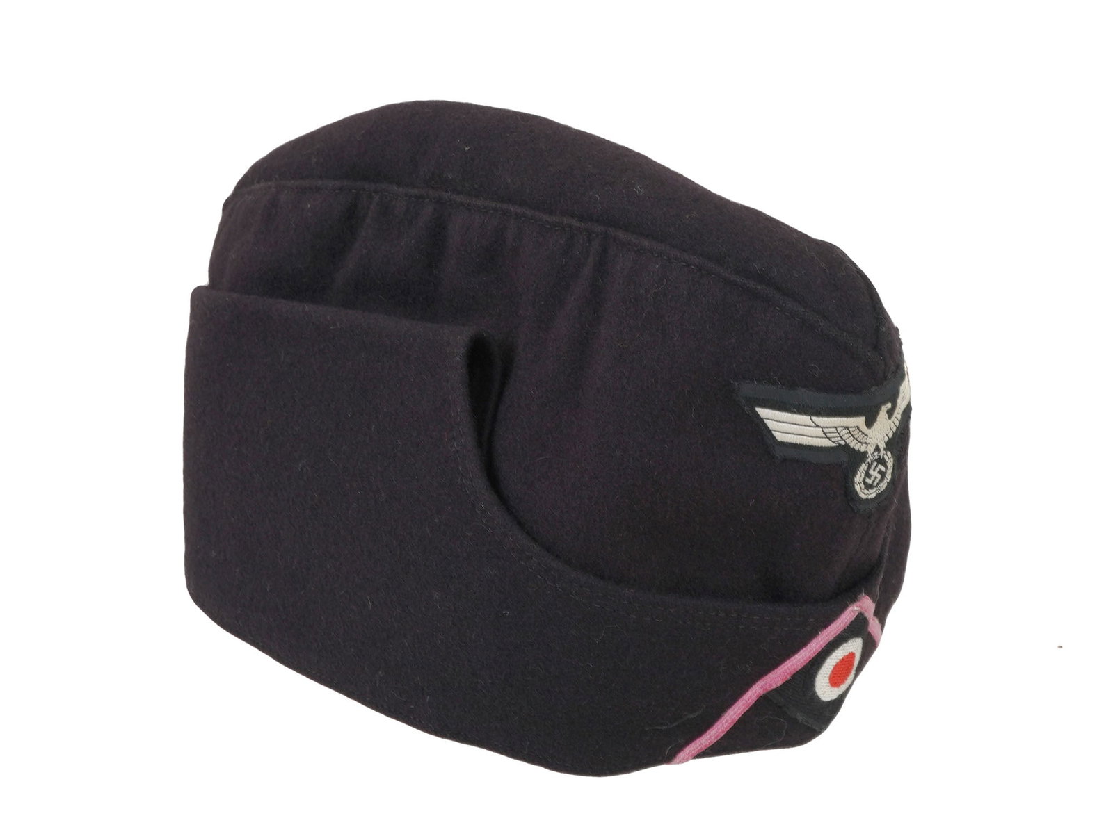 WWII NAZI GERMAN PANZER GRENADIER OVERSEAS CAP: A World War II German EM SS overseas cap. Grey wool narrow hat that could be folded flat and tucked into a belt or haversack. The front bears a complete set of Panzer Grenadier insignia, with a Reichs