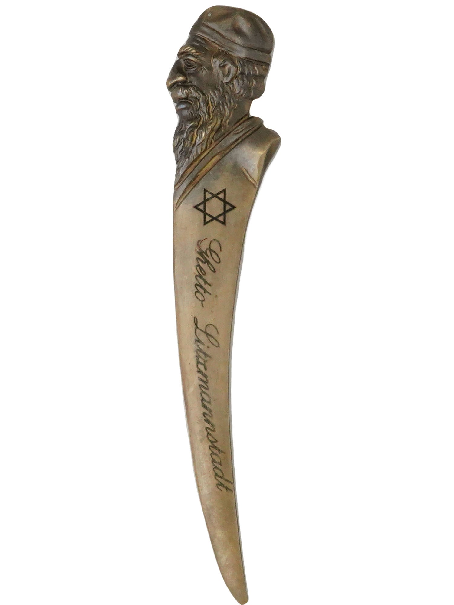 WWII LITZMANNSTADT GHETTO LETTER OPENER PAPER KNIFE: A WWII cast brass paper knife or letter opener. The figurative handle represents a profile of a Jewish man. The blade is engraved with a Magen David and Litzmannstadt Ghetto inscription, Chaim Rumkows