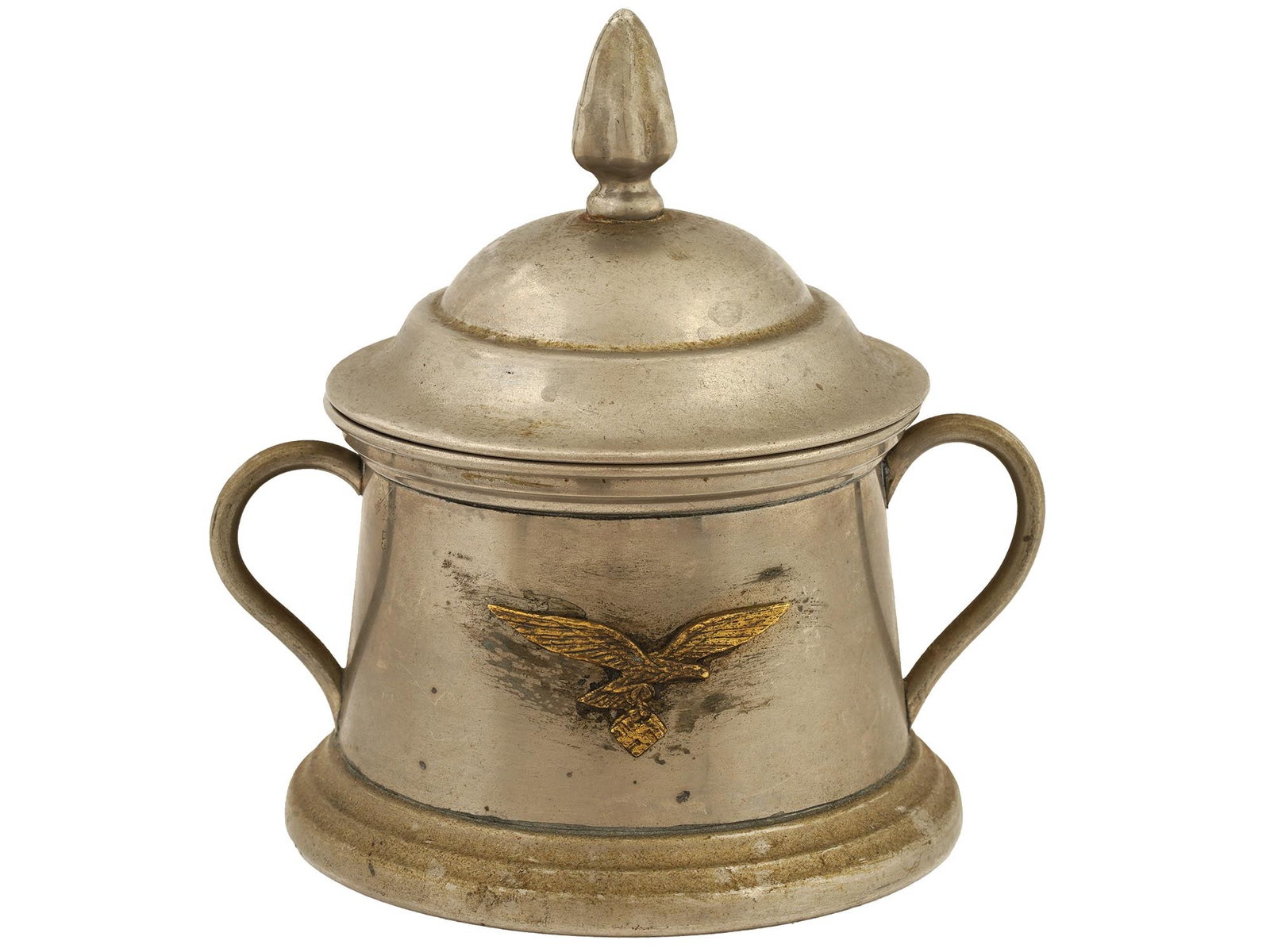 WWII TYPE NAZI GERMAN LUFTWAFFE LIDDED SUGAR BOWL: A World War II Nazi German era type lidded sugar bowl. The item is cylindrical in shape, slightly tapering towards the top, with two handles on the sides. In the middle, there is a relief image of the