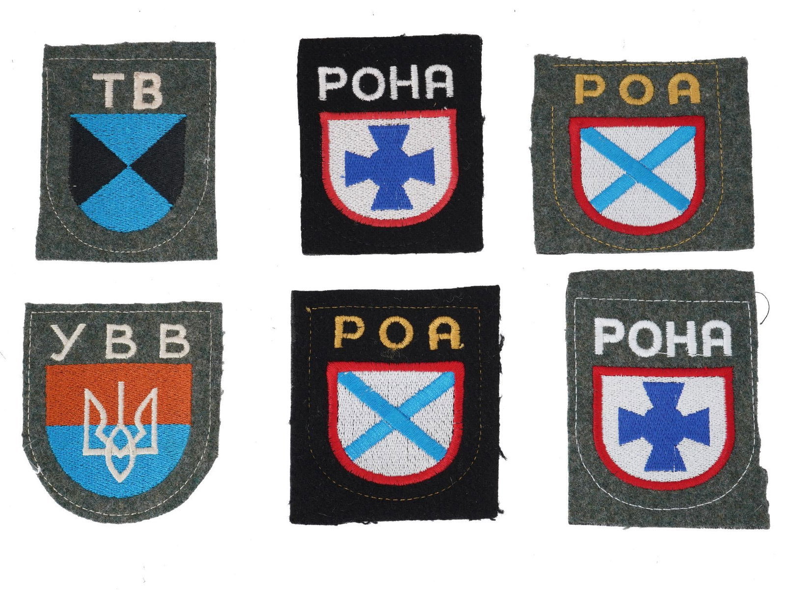 WWII GERMAN BADGES PATCHES RUSSIAN UKRAINIAN VOLUNTEERS: A group of items associated with Russian and Ukrainian volunteers who fought on the Nazi side during WWII, including three badges and six patches. The collection features items related to the Russian 