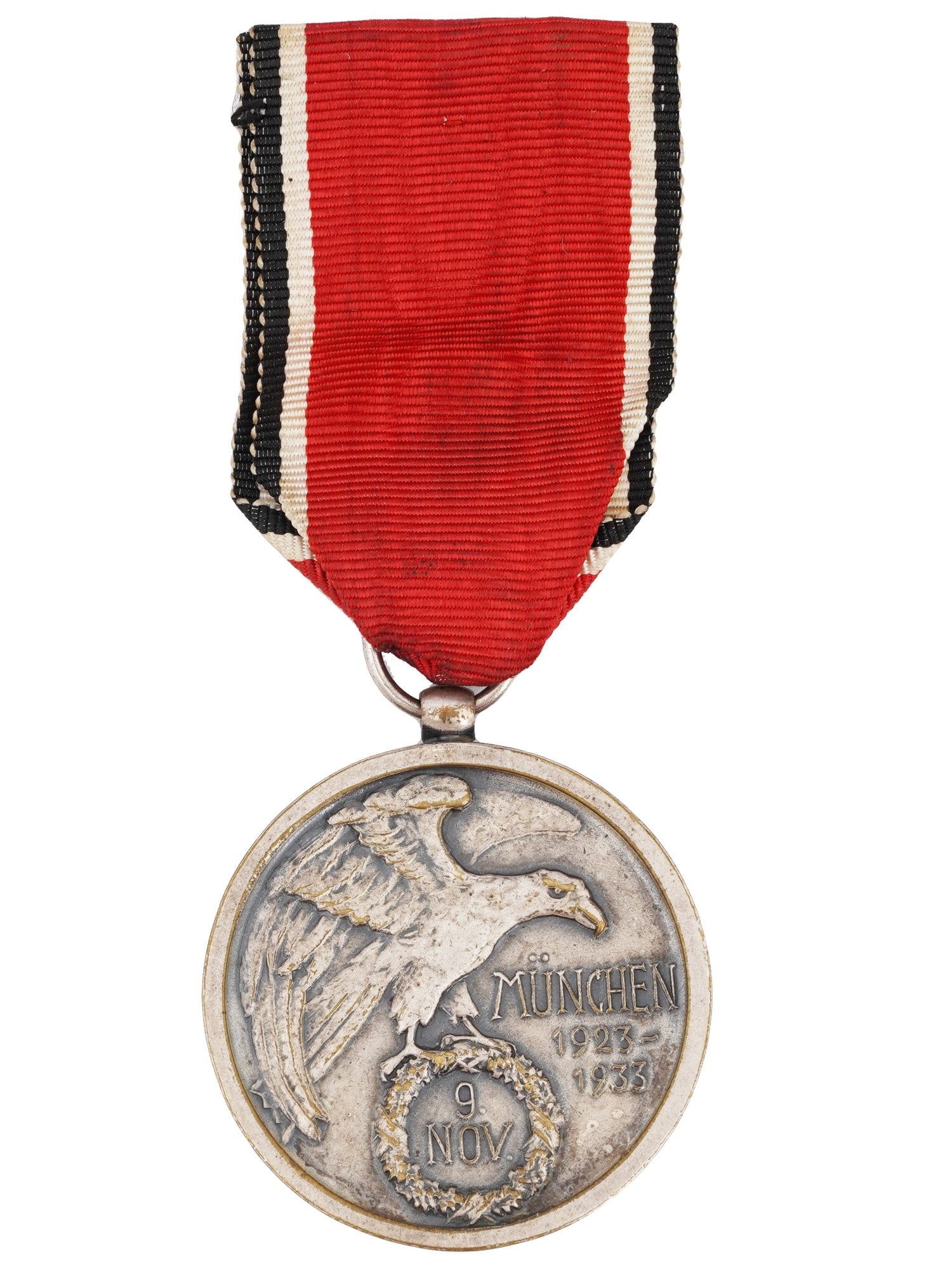 PRE WWII GERMAN BLUTORDER BLOOD ORDER WITH RIBBON: A pre WWII German Blutorder Blood Order with a ribbon. The Blood Order is a medal established on March 15, 1934, by Adolf Hitler in memory of the 9 November 1923 coup attempt of the Nazi Party. The re