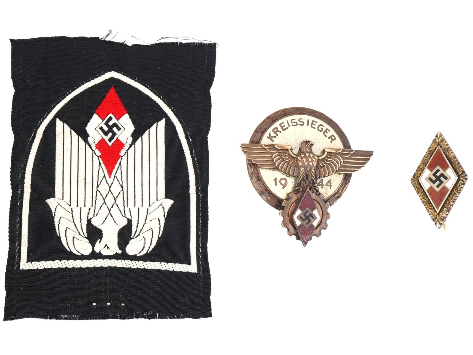 WWII GERMAN HITLER YOUTH PATCH AND BADGES: A group of three WWII German Hitler Youth collectibles including Standarte Flag patch, Hitlerjugend Kreissieger 1938 badge, and German WWII Hitlerjugend honor badge. Nazi German Badges And Collectible