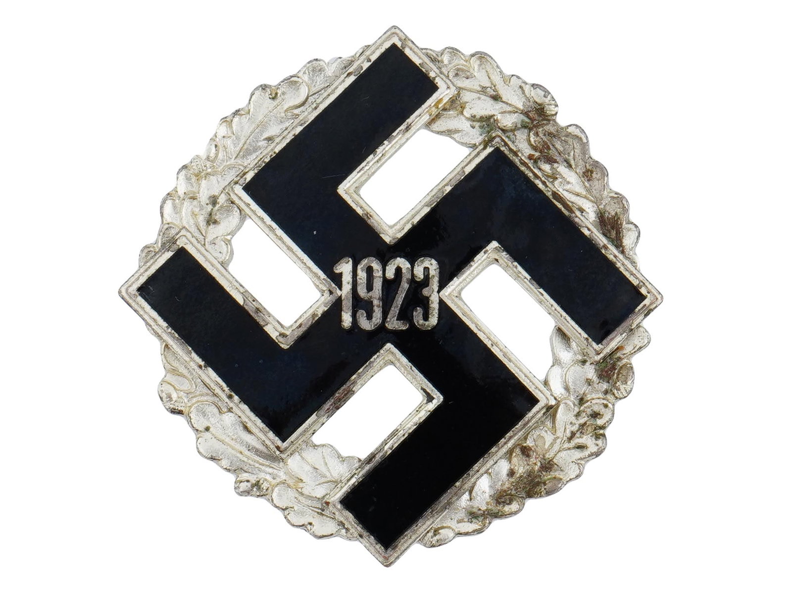 RARE WWII GERMAN NSDAP 1923 GENERAL HONOR GAU BADGE: A rare World War II German NSDAP 1923 General Honor Gau Badge, the highest decoration awarded at the Gau level and awarded by Nazi Party headquarters in Munich. Frame with a black lacquered swastika w