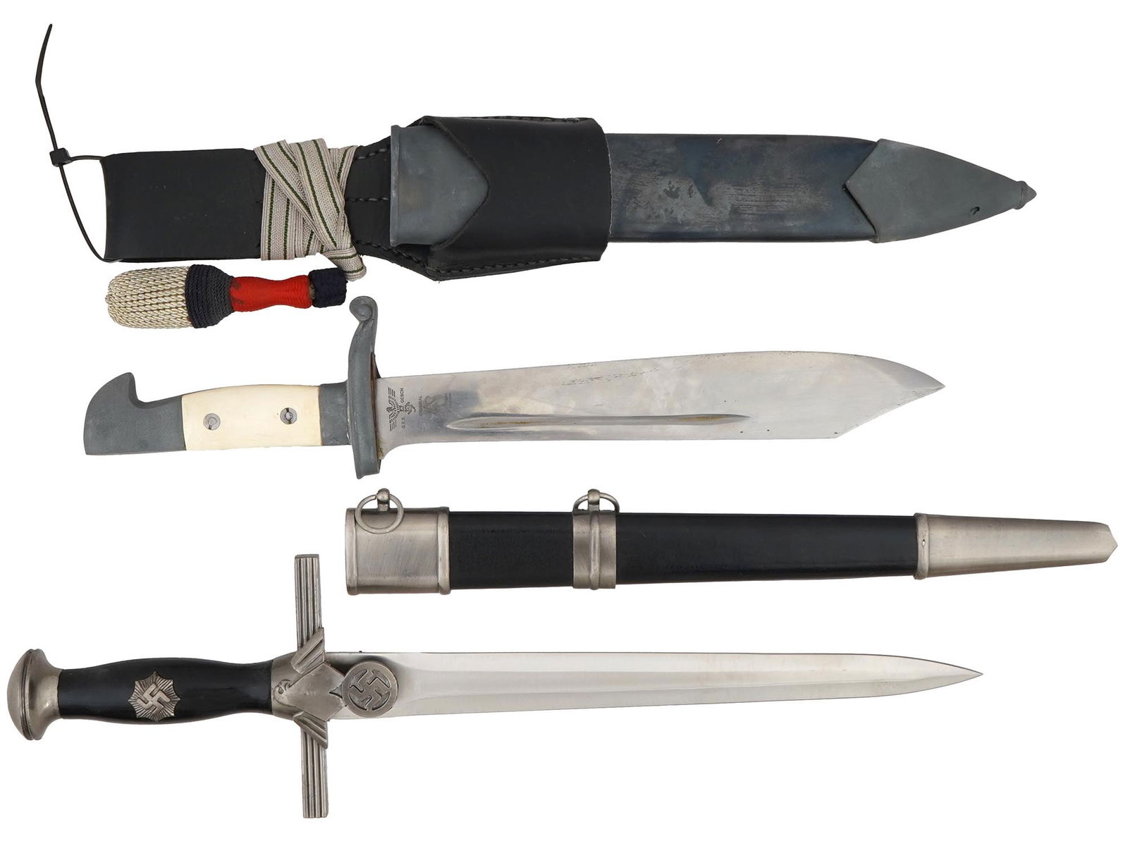 WWII NAZI GERMAN TENO AIR PROTECTION LEAGUE DAGGERS: A WWII Nazi German Technical Emergency Corps enlisted mans hewer dagger features a one-fuller blade with a ricasso engraved with a relief Nazi eagle and swastika insignia. The dagger has cream bakelit