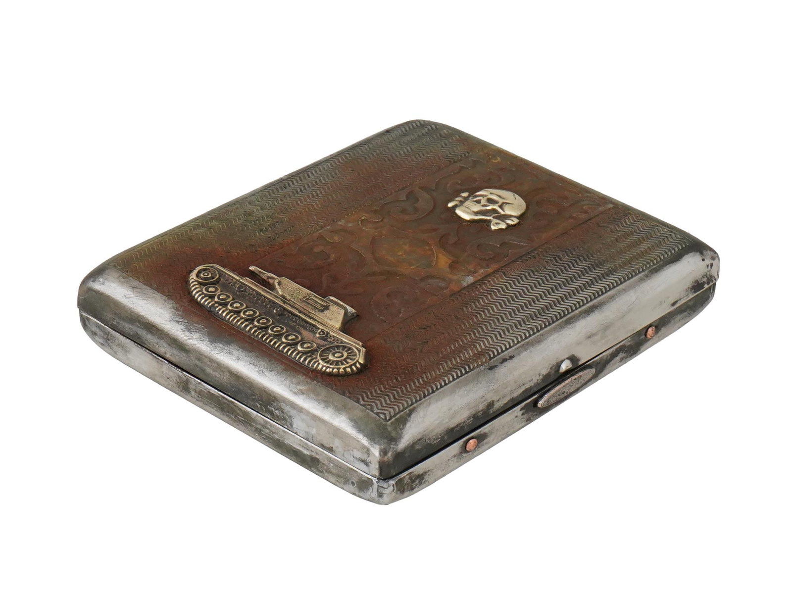 WWII GERMAN WAFFEN SS PANZER OFFICERS CIGARETTE CASE: A WWII Nazi German type Waffen SS panzer officers cigarette case. The case is adorned with an engraved floral ornament, and two gilt metal overlays representing a Totenkopf skull and a tank. Marked, R
