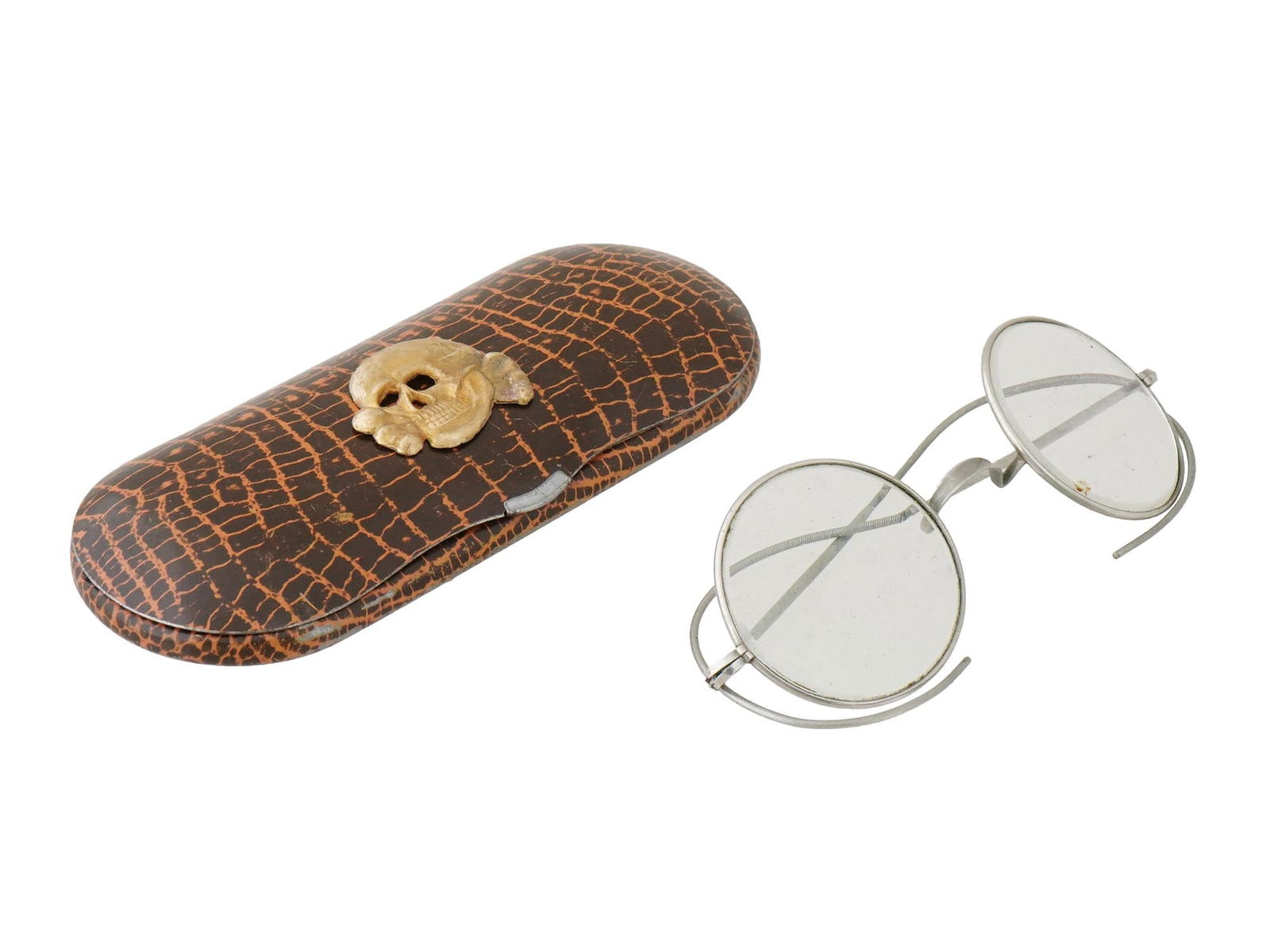 GERMAN WWII TYPE WAFFEN SS TOTENKOPF GLASSES W CASE: A WWII type Nazi German Waffen SS Totenkopf round glasses with a leather case. The exterior of the brown leather case is adorned with a gilt metal plaque depicting a Totenkopf skull swastika insignia.