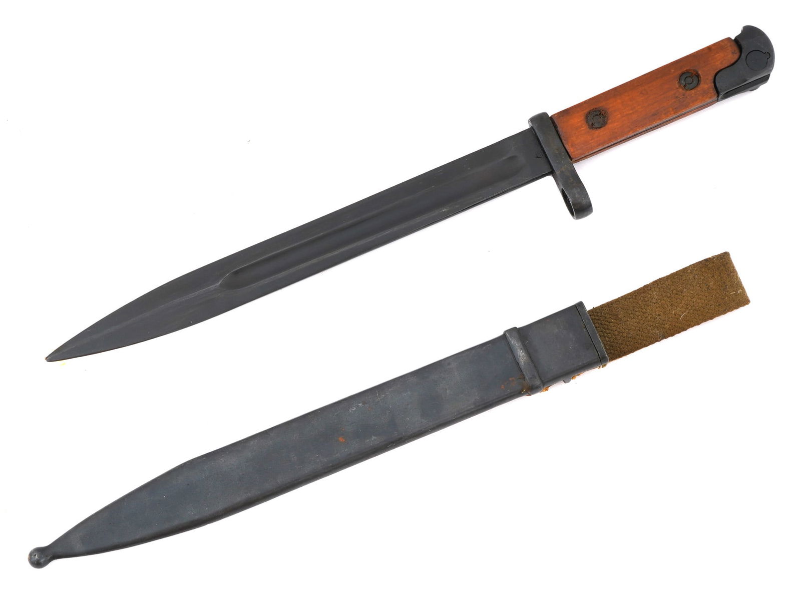 SOVIET RUSSIAN MODEL 1940 TOKAREV BAYONET WITH SCABBARD: A Soviet Russian Model 1940 Tokarev bayonet, designed for use with the SVT-40 rifle. It features a single-edged blade with a false edge, a spear point, and single unstopped fullers for added strength