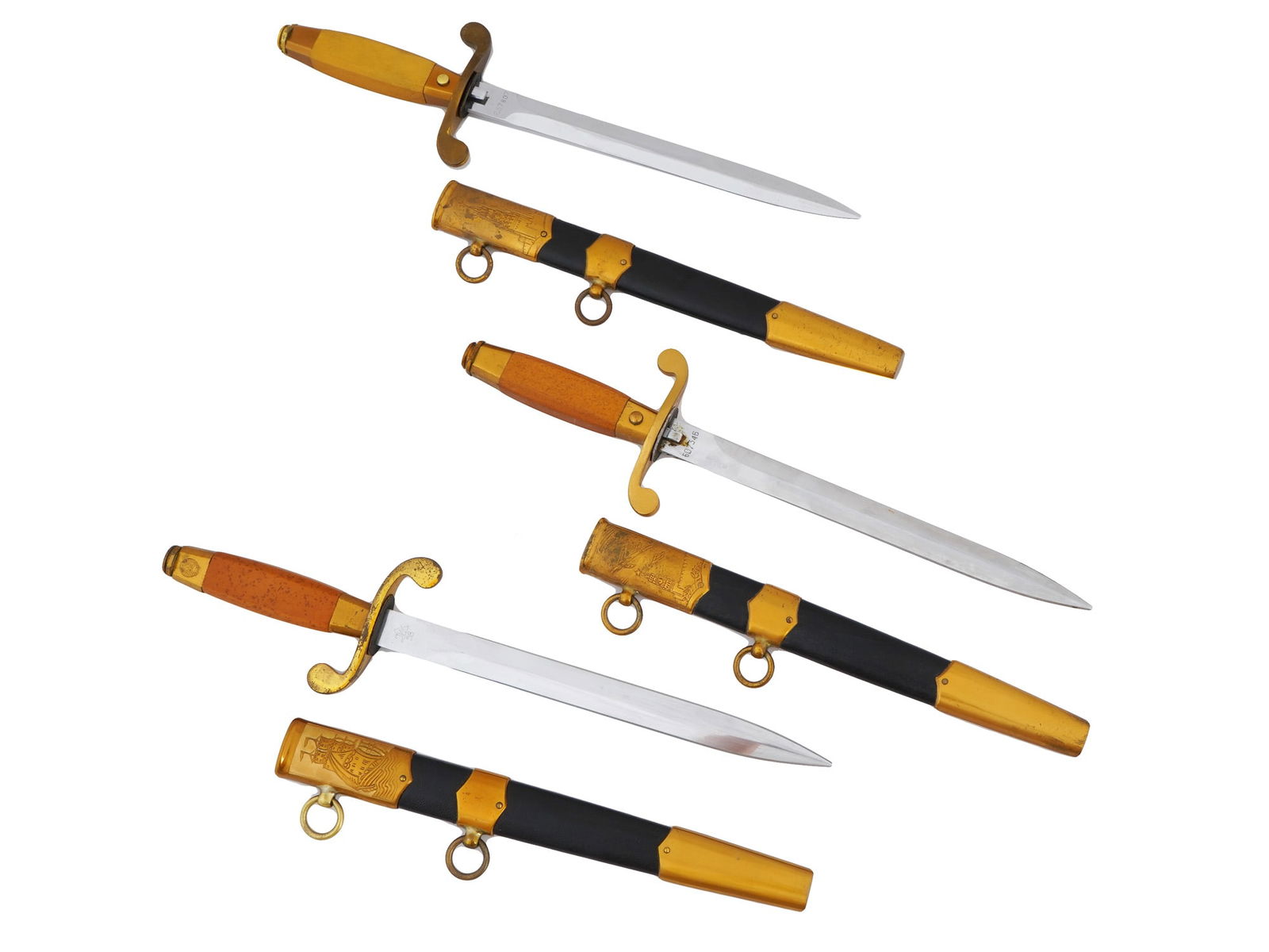 RUSSIAN SOVIET NAVAL AIRBORNE ARMY DAGGERS W SCABBARDS: A set of Russian Soviet naval, airborne and army daggers, elements of the dress uniform for officers in the Soviet Union. The daggers feature edged steel blades marked at the ricasso and crossguards w