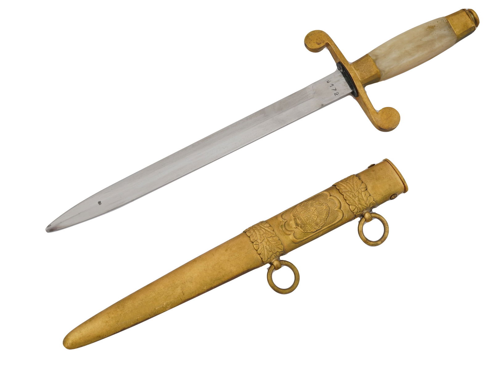 SOCIALIST ROMANIAN OFFICERS DRESS DAGGER WITH SCABBARD: A Socialist Romanian army officers dress dagger with a chrome-plated steel blade, with a semi-sharp tip and a plain design, marked with a number on the ricasso. The dagger has a brass crossguard with