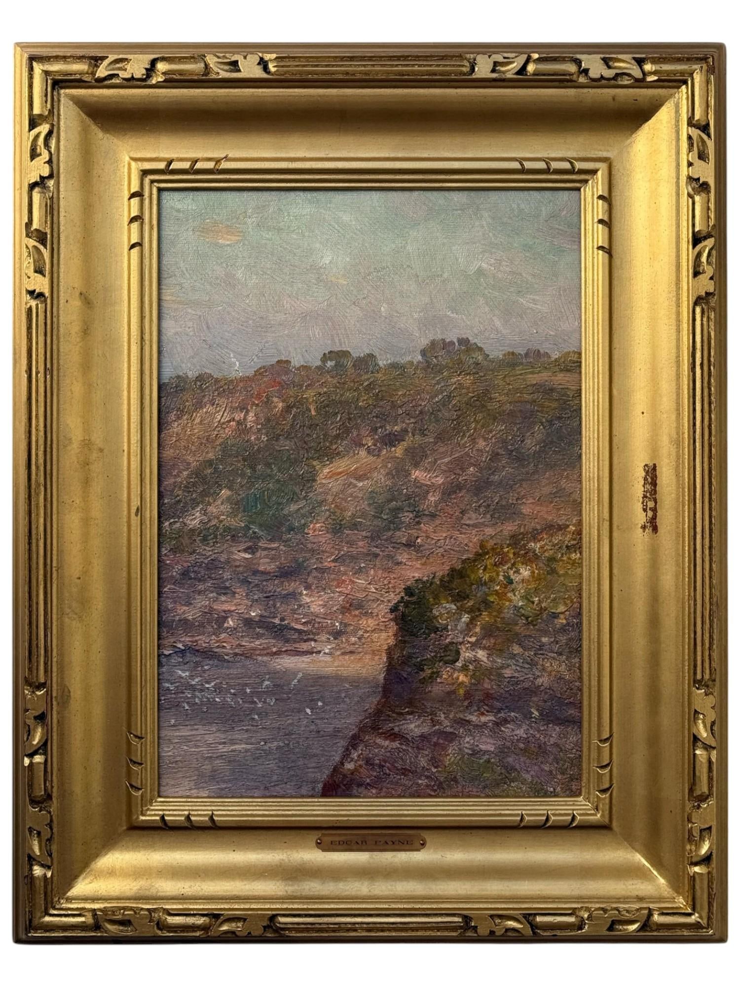 ANTIQUE AMERICAN OIL PAINTING BY EDGAR ALWIN PAYNE: Edgar Alwin Payne, American, 1883 to 1947, an oil on board painting Rocky Coast depicting a coastal landscape. Housed in an ornate gilt wood frame with a metal name plate below. Edgar Payne was a reno
