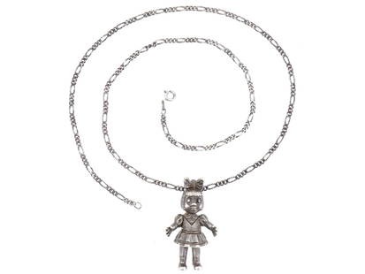 VINTAGE STERLING SILVER CHAIN AND A DOLL PENDANT: A vintage sterling silver necklace featuring a chain and a pendant modeled as a doll. Hallmarked. Circa the mid late 20th century. Vintage Silver Necklaces And Jewelry Designs For Collectors. Total we