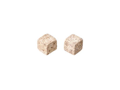 PAIR OF ANCIENT ROMAN CARVED STONE DICE 100 TO 300 AD: A pair of ancient Roman carved stone dice dated from 100 to 300 AD. Carved from stone and featuring a classic design, these dice evoke the excitement and anticipation of games played by Romans centuri