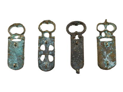 FOUR ANTIQUE GRAND TOUR ERA BRONZE BELT BUCKLES: A lot of four antique bronze belt buckles of the Grand Tour. The items are reproductions of ancient Roman openwork design belt buckles with relief images including a scorpion and a calf. Such objects