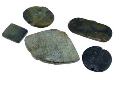 GROUP OF FIVE ANCIENT HAND CARVED STONE PENDANTS