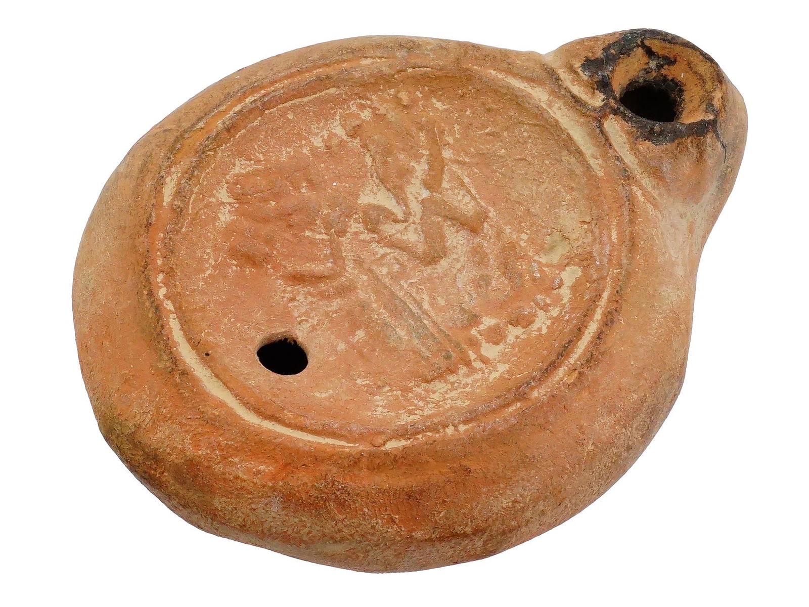 ANCIENT ROMAN CLAY OIL LAMP WITH EROTIC IMAGE: An ancient Roman clay oil lamp of rounded shape adorned with a relief erotic scene. Crafted with care by skilled artisans of the time, it shows an erotic scene at the top and decorated with patterns t