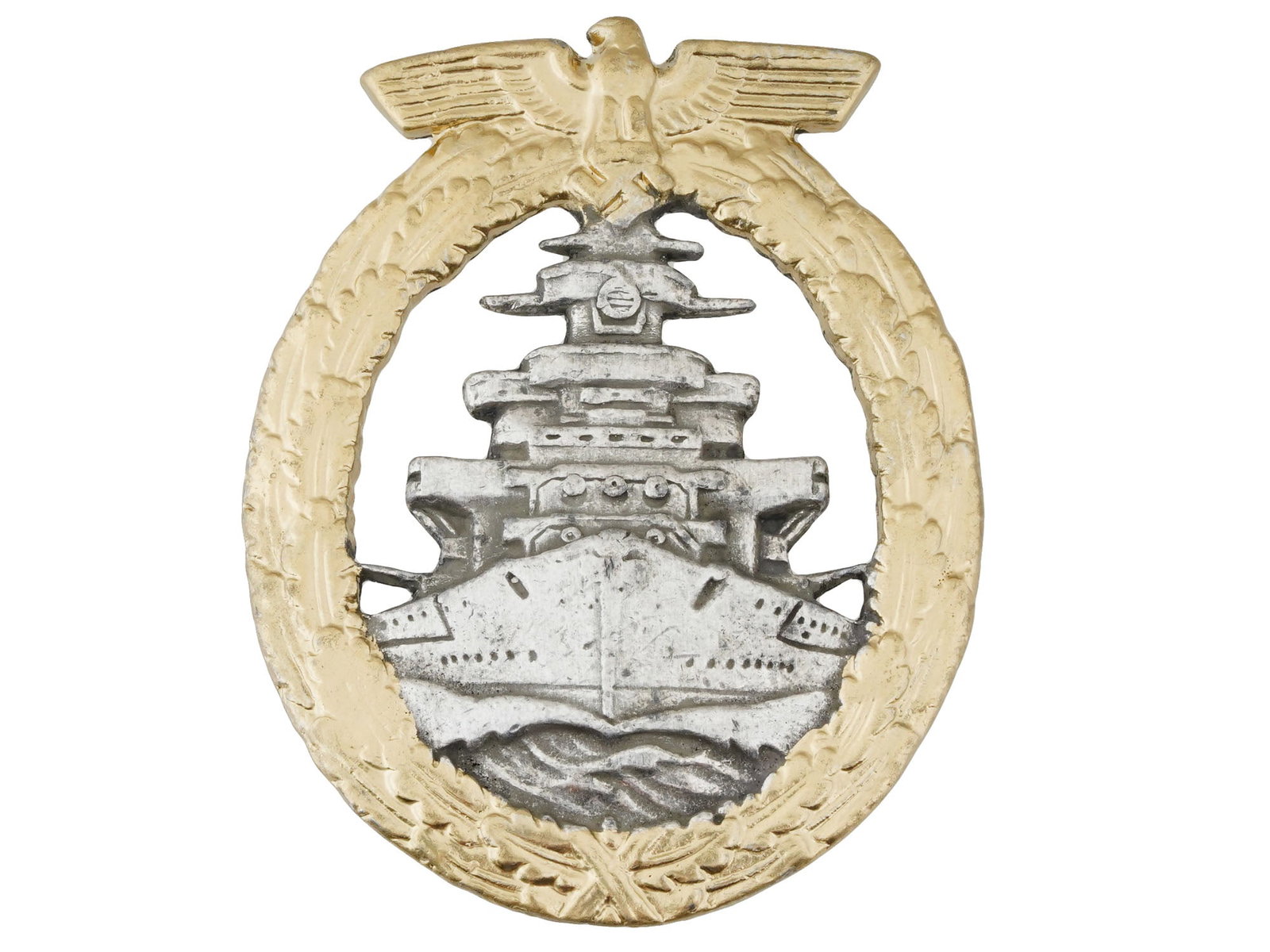 GERMAN WWII TYPE KRIEGSMARINE HIGH SEAS FLEET BADGE: A WWII Nazi German type Kriegsmarine High Seas Fleet badge. Die struck alloy with solid back with silver and gold wash finish. Reverse with vertical hinged broad pin. Marked, RZM, on the backside. Sec